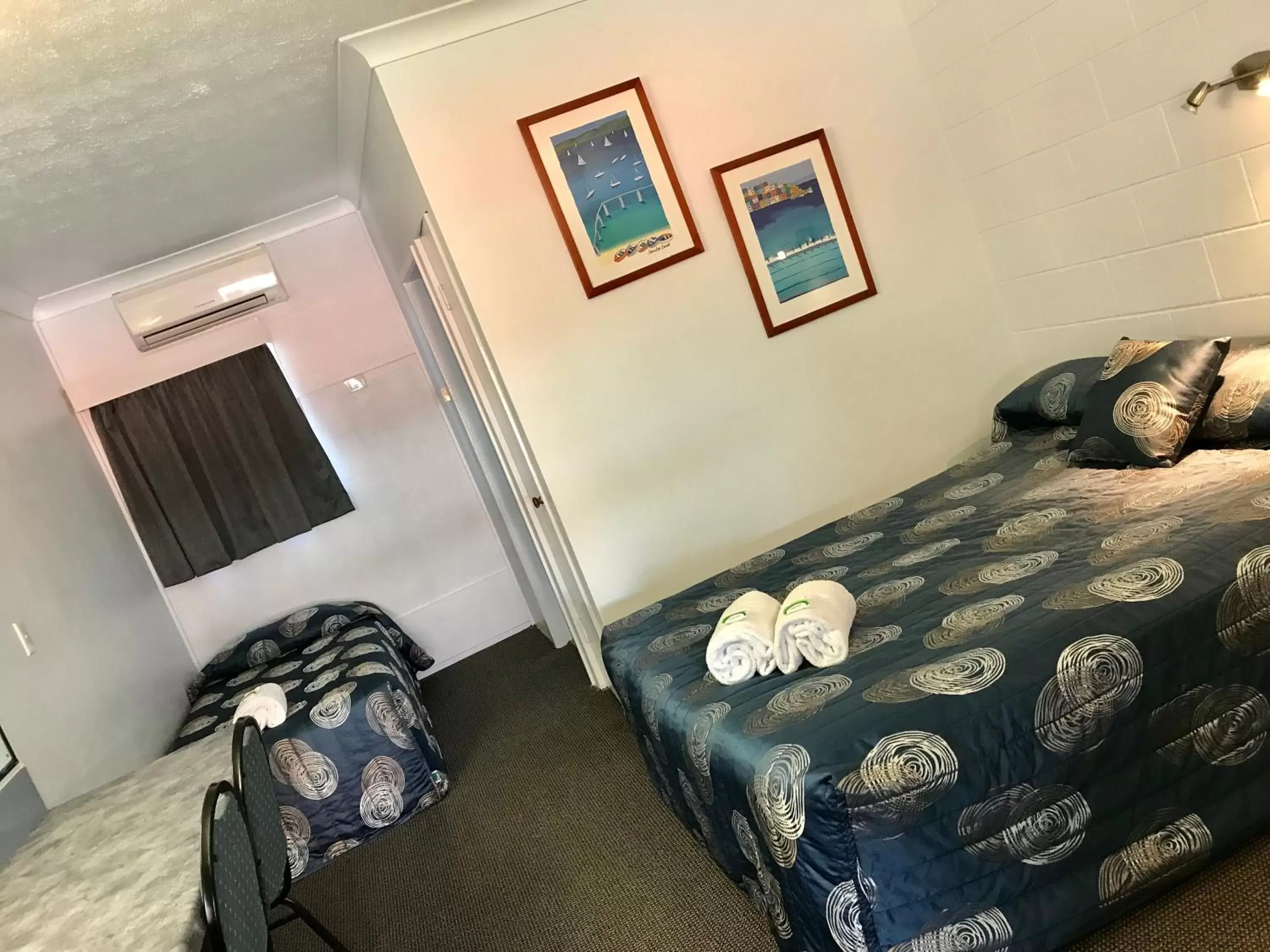 Bed in Mackay Rose Motel