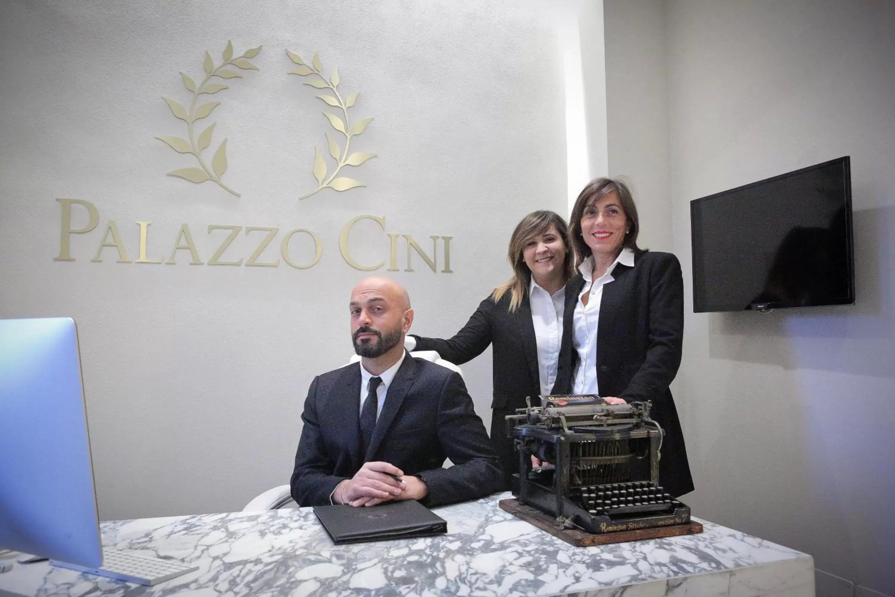 Staff in Palazzo Cini Luxury Rooms in Pisa