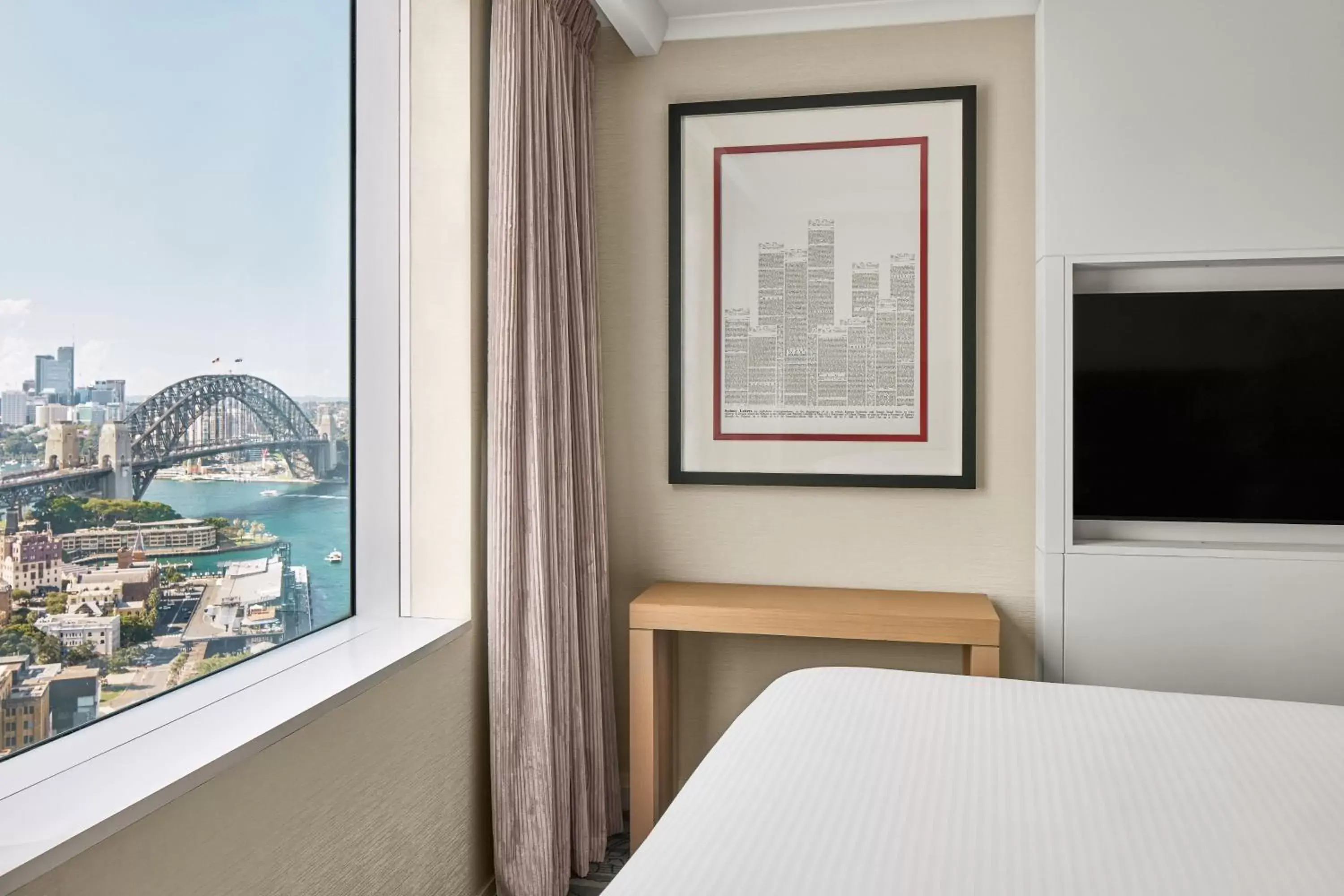 Bedroom, TV/Entertainment Center in Sydney Harbour Marriott Hotel at Circular Quay