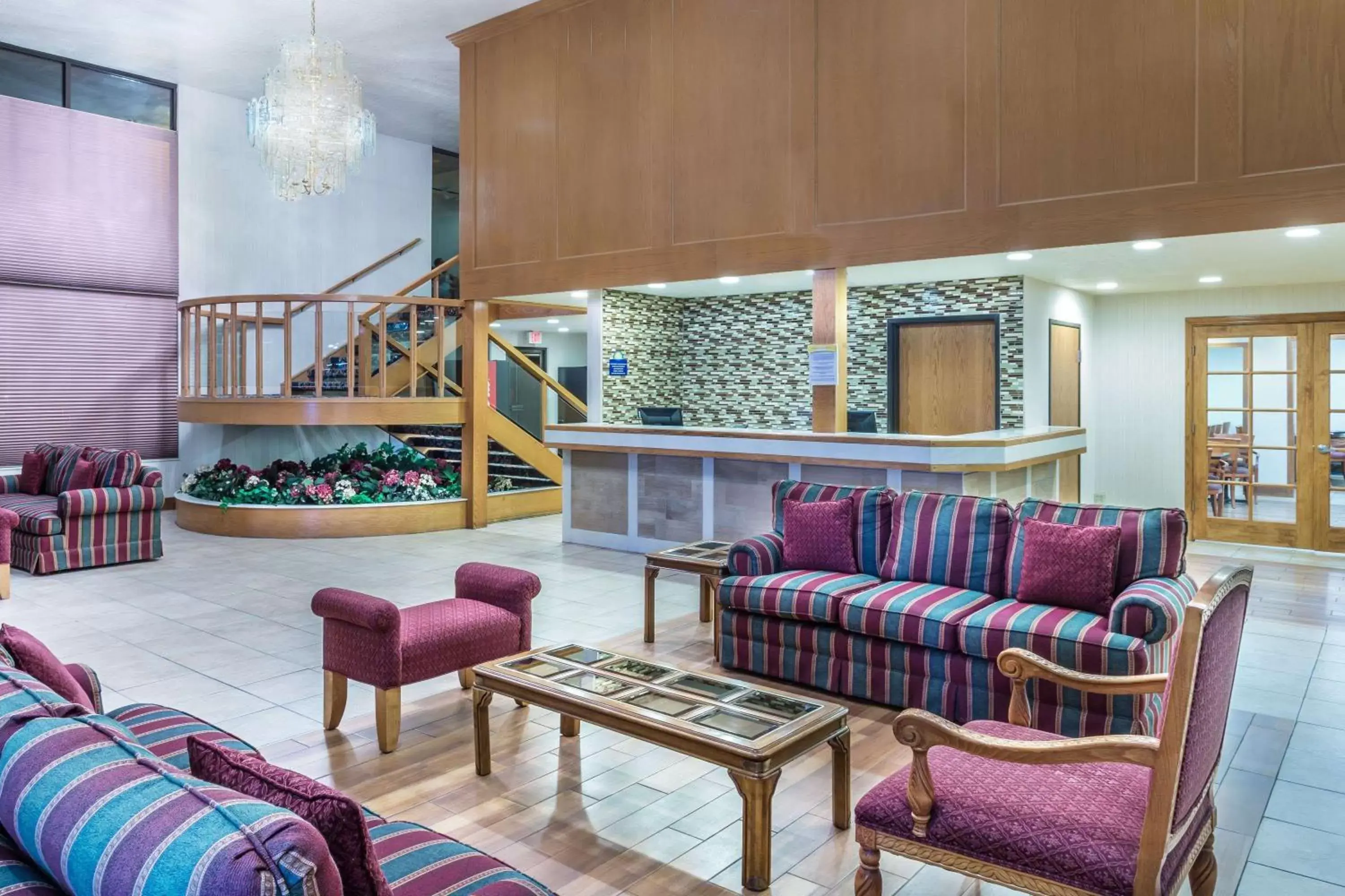 Lobby or reception, Seating Area in Days Inn & Suites by Wyndham Logan