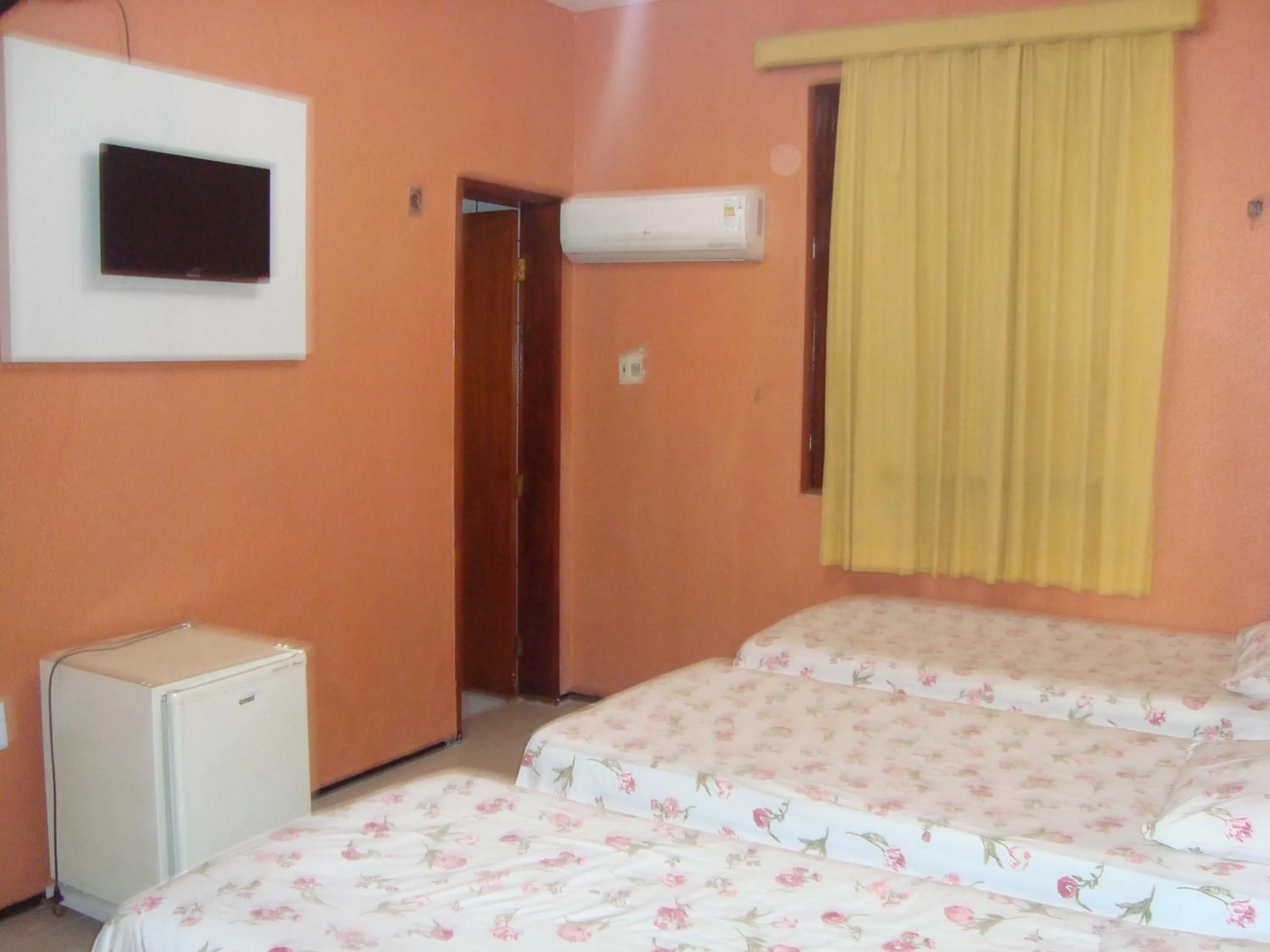 Bed in Pousada Vianna's