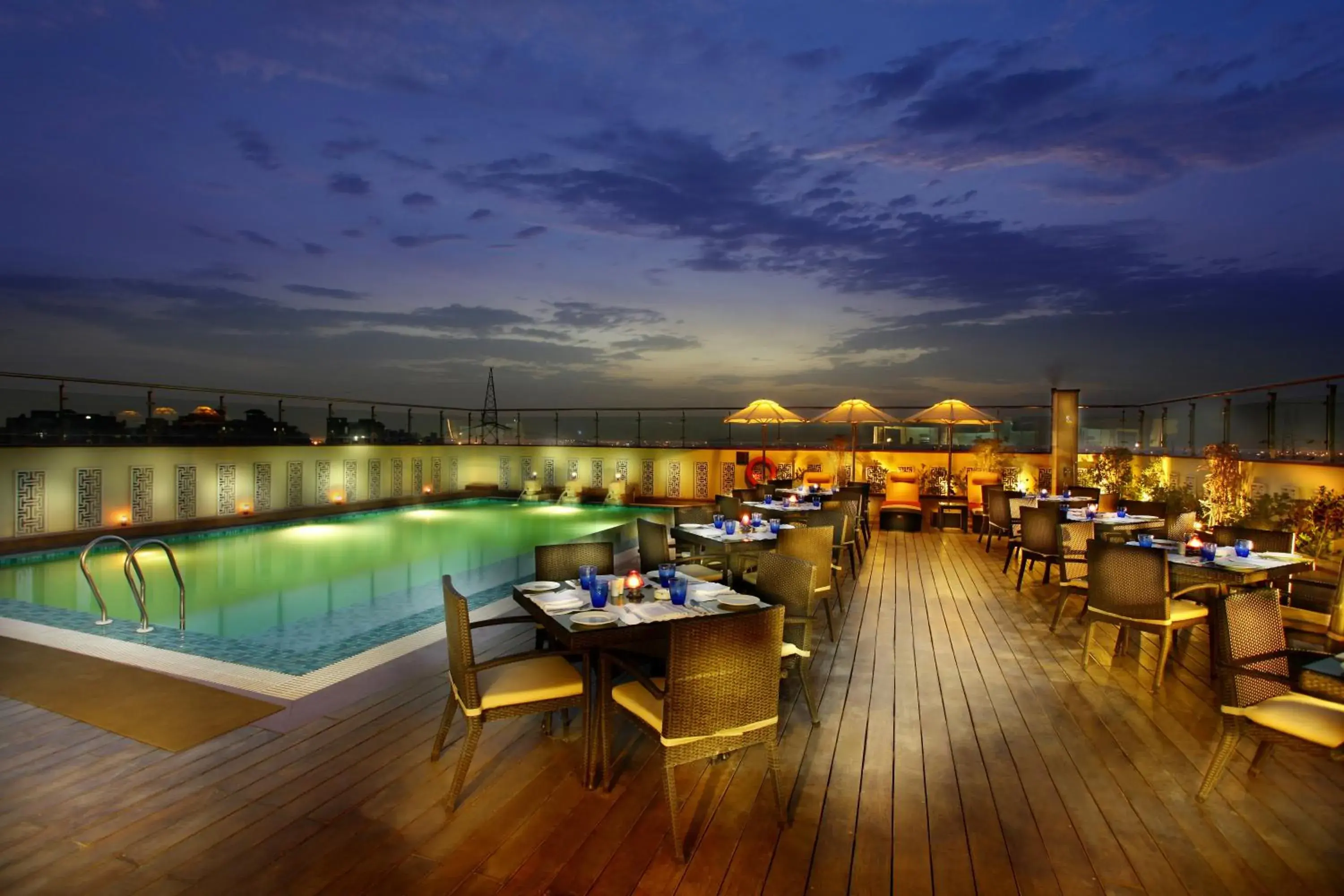 Balcony/Terrace, Swimming Pool in Mahagun Sarovar Portico Suites Ghaziabad