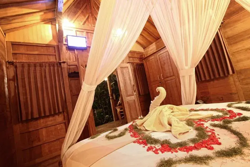 Bed in Villa Mandi Ubud