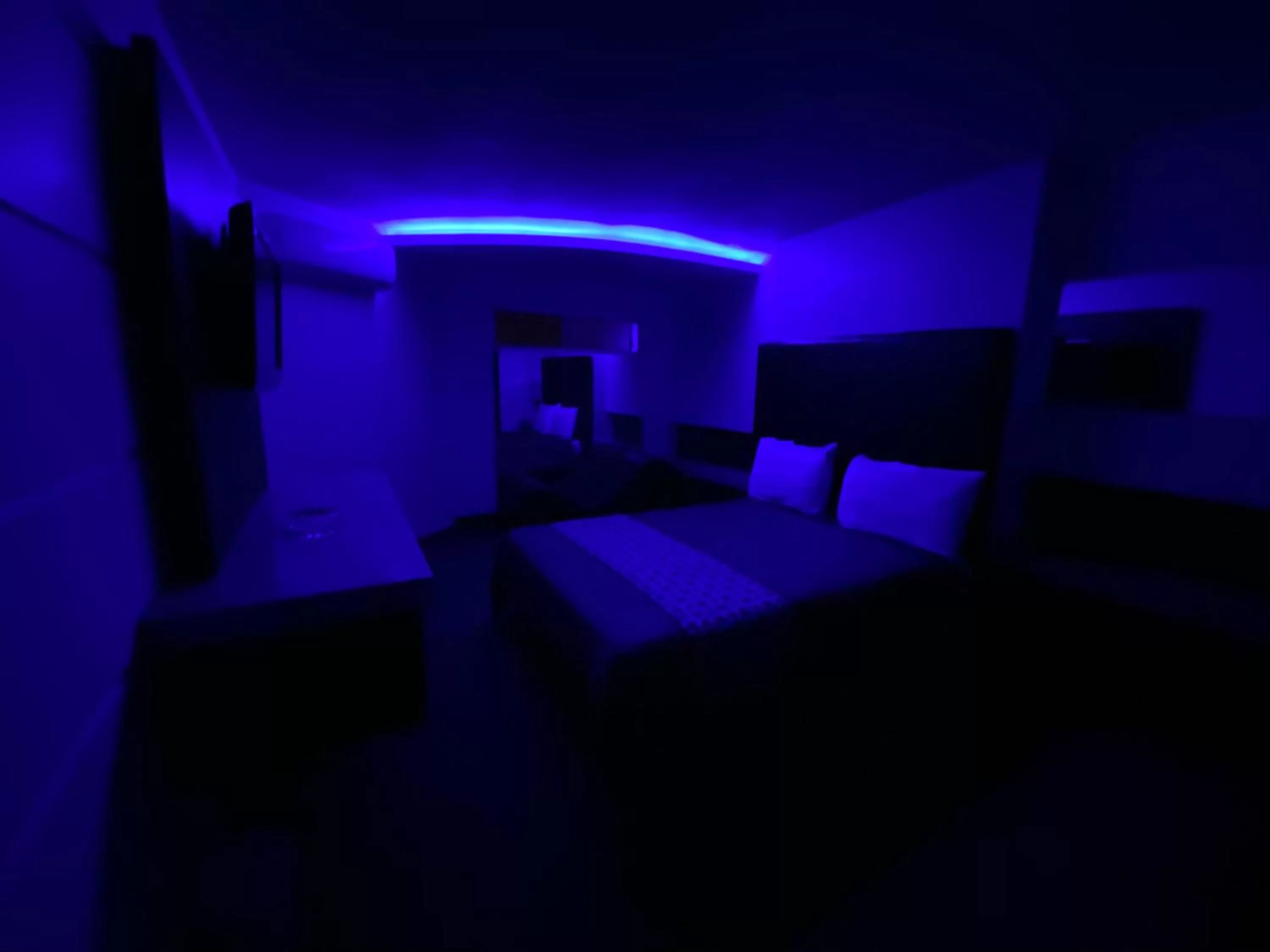 Bed in Motel Encuentro