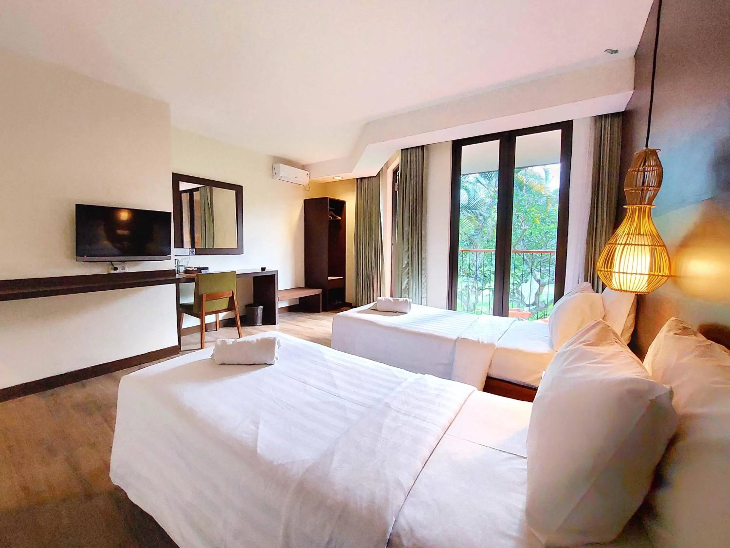 Bed in The Batu Hotel & Villas