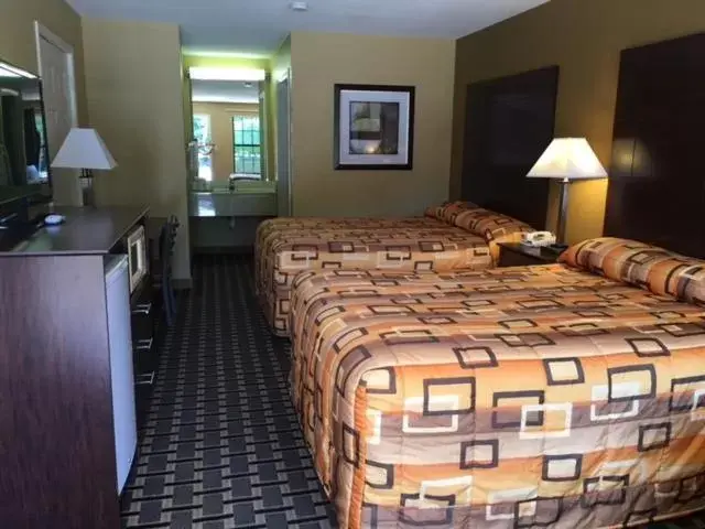Bed in Executive Inn and Suites Longview