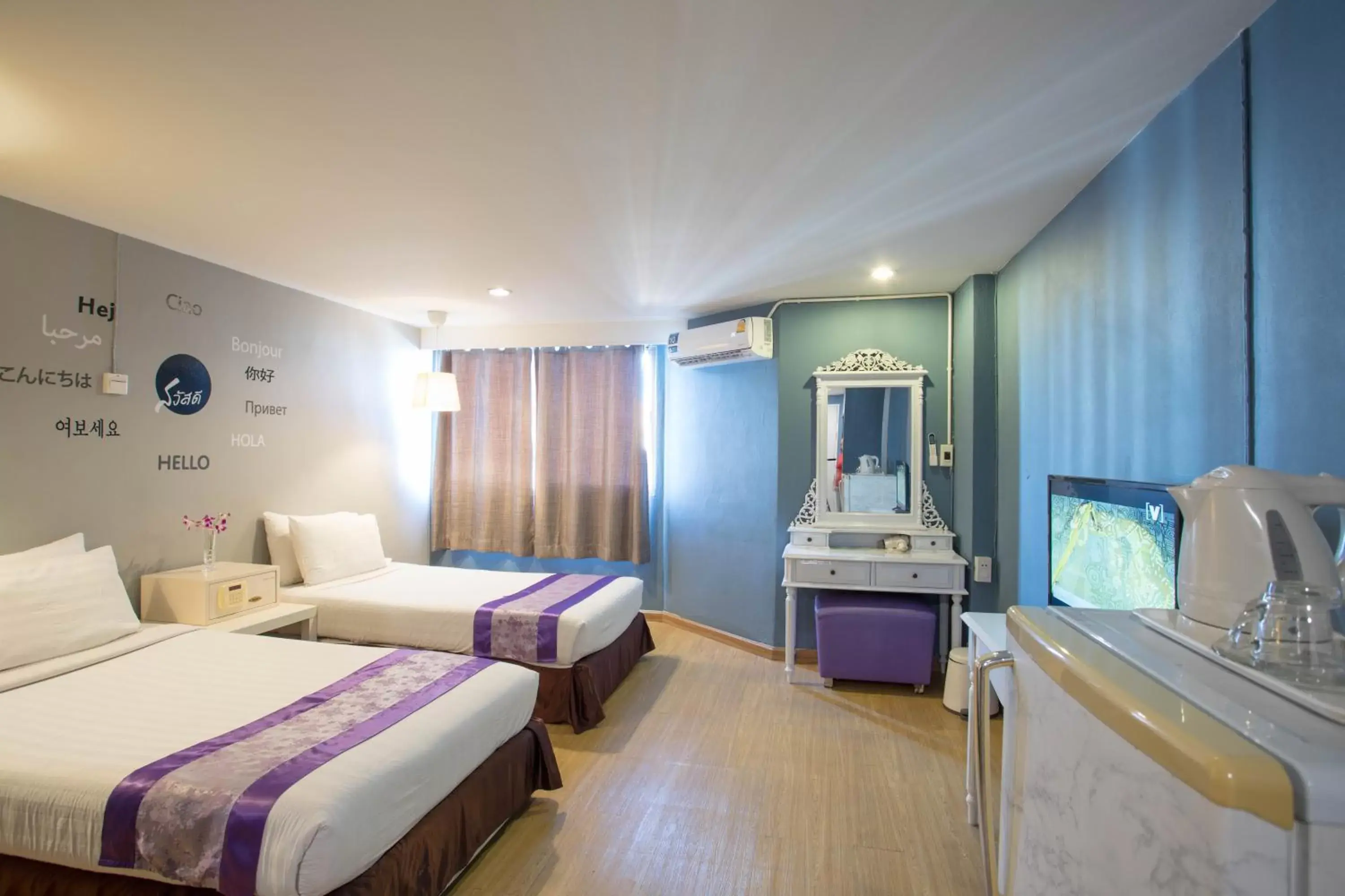 Bed in Sawasdee Siam Hotel