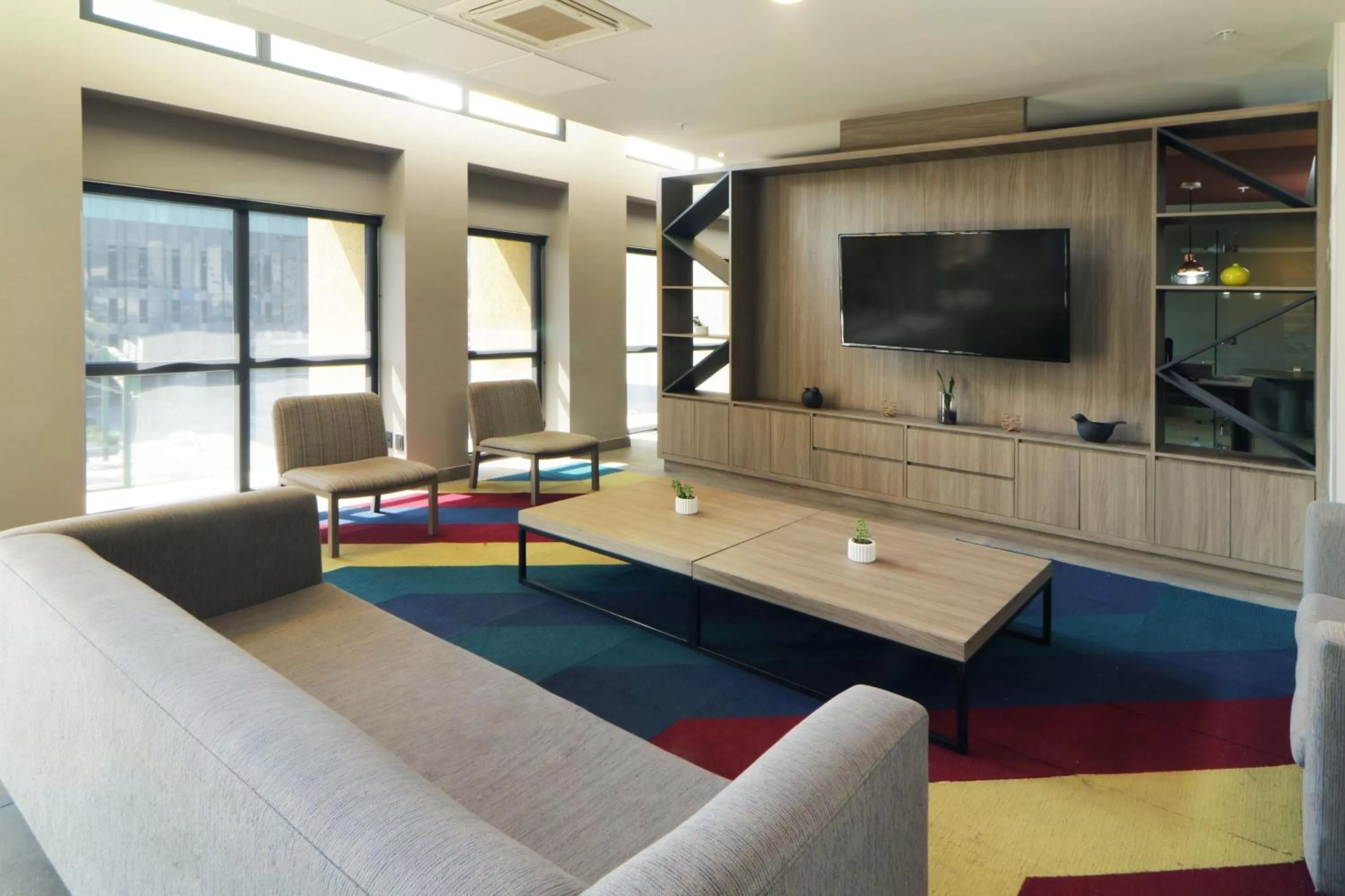 Lobby or reception in City Express Plus by Marriott Monterrey Galerías