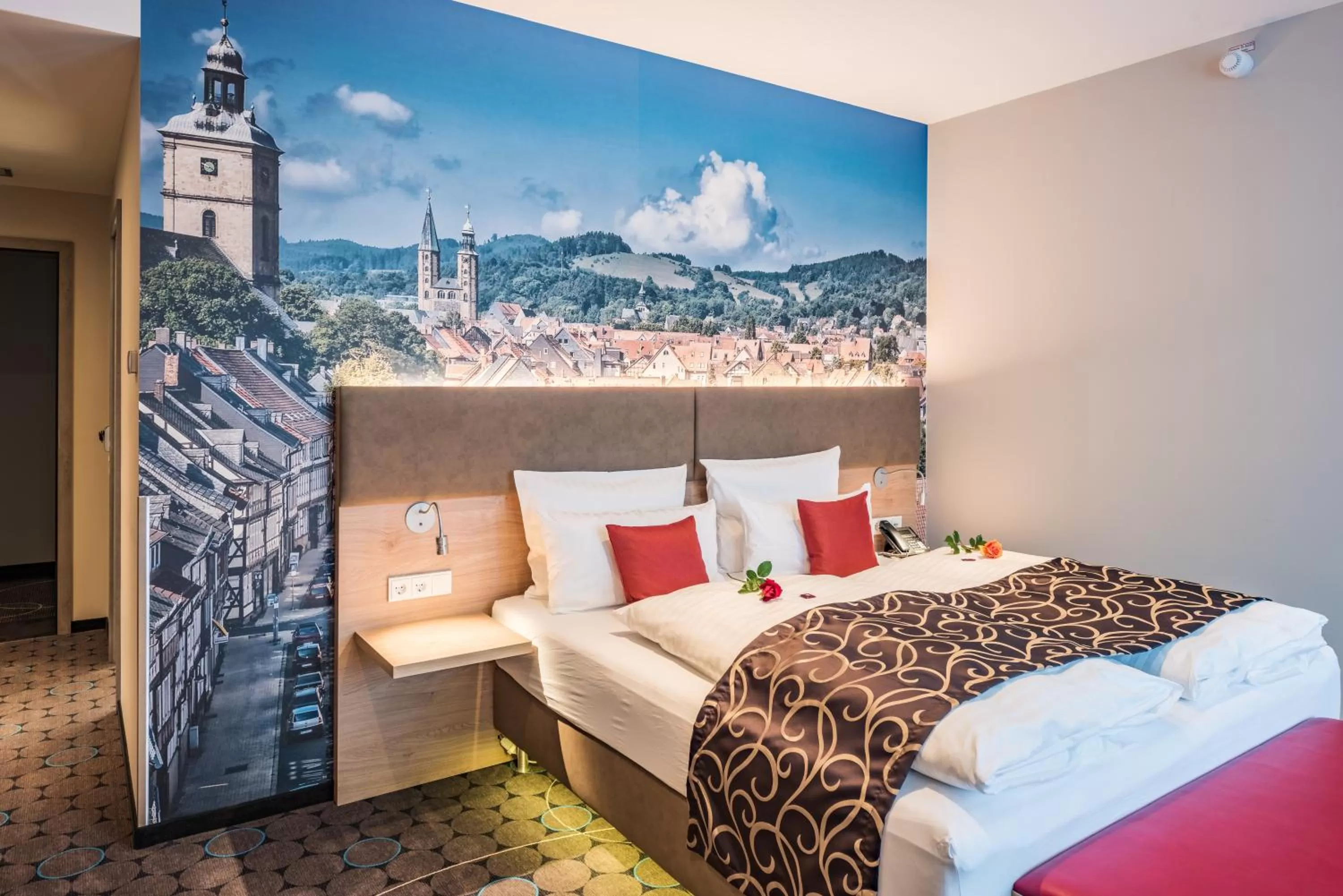 Photo of the whole room, Bed in AKZENT Hotel Villa Saxer