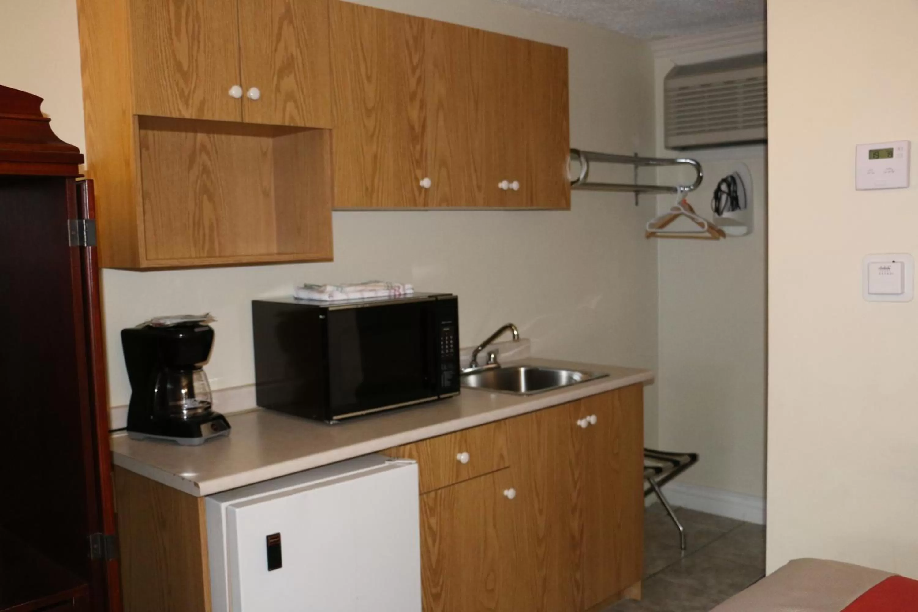 Kitchen or kitchenette in Midtown Motel & Suites