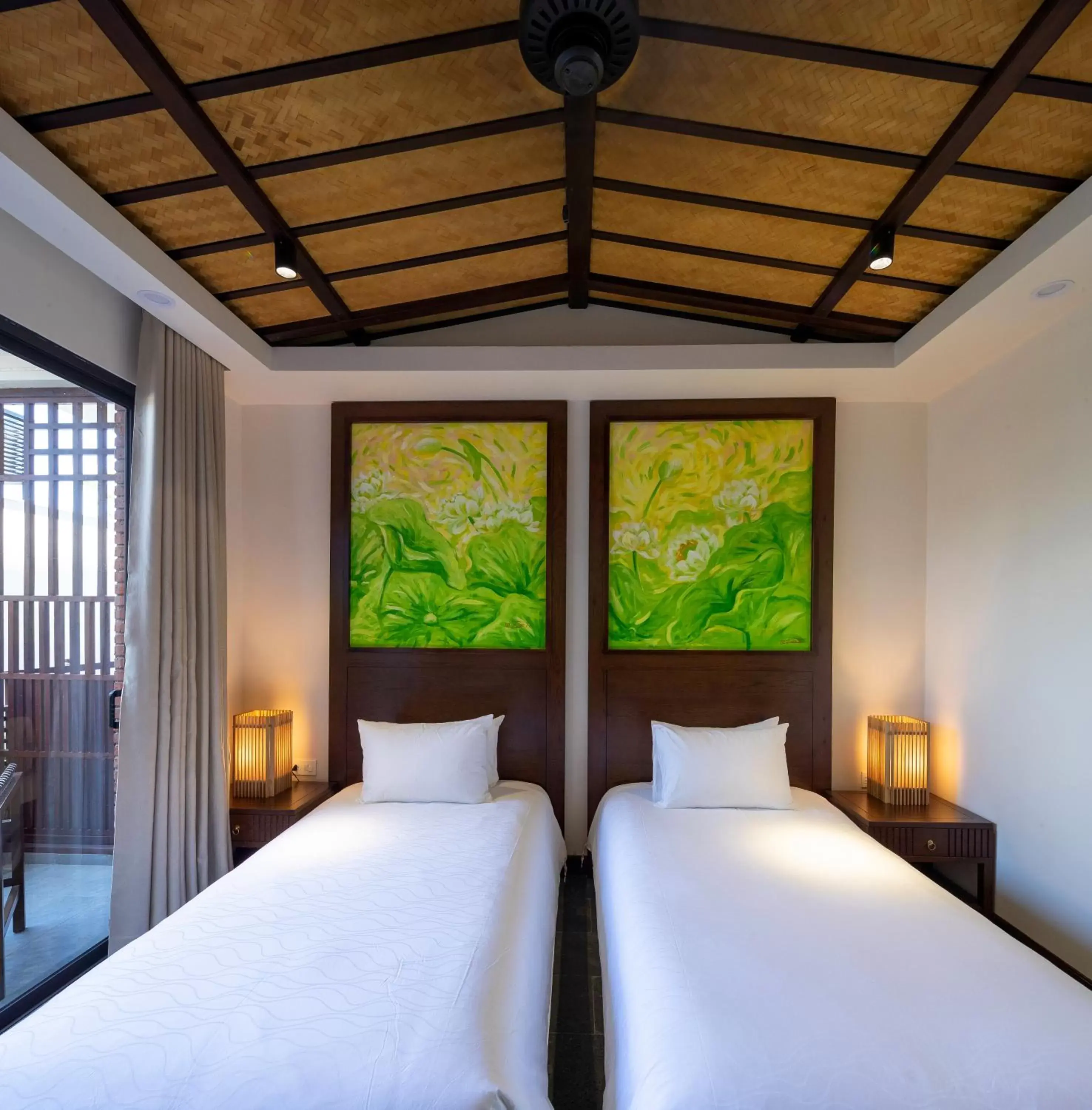 Bed in Nghê Prana Hotel and Spa Hoi An Bed in Nghê Prana Hotel and Spa Hoi An