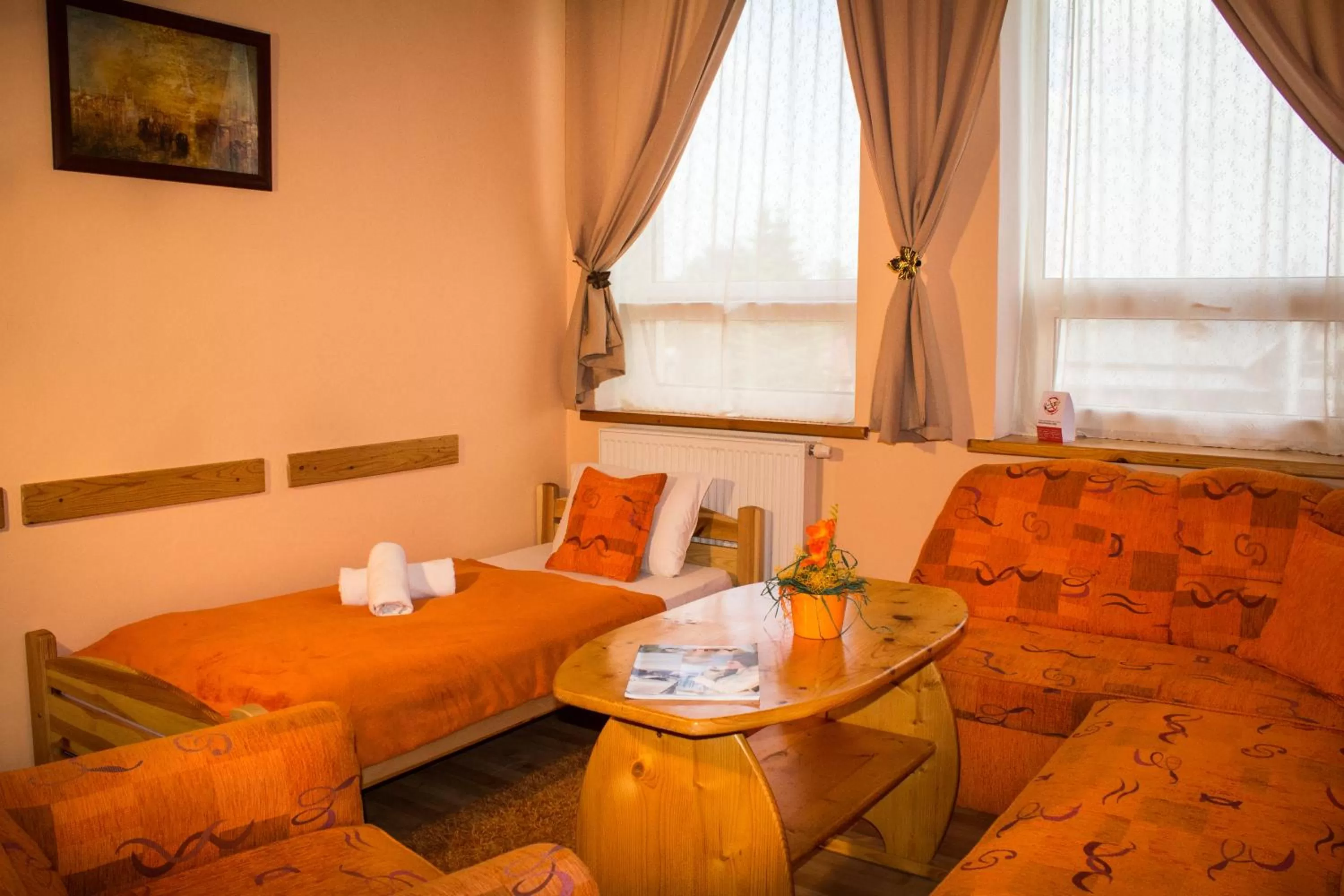 Living room, Bed in Apartmány Renomal