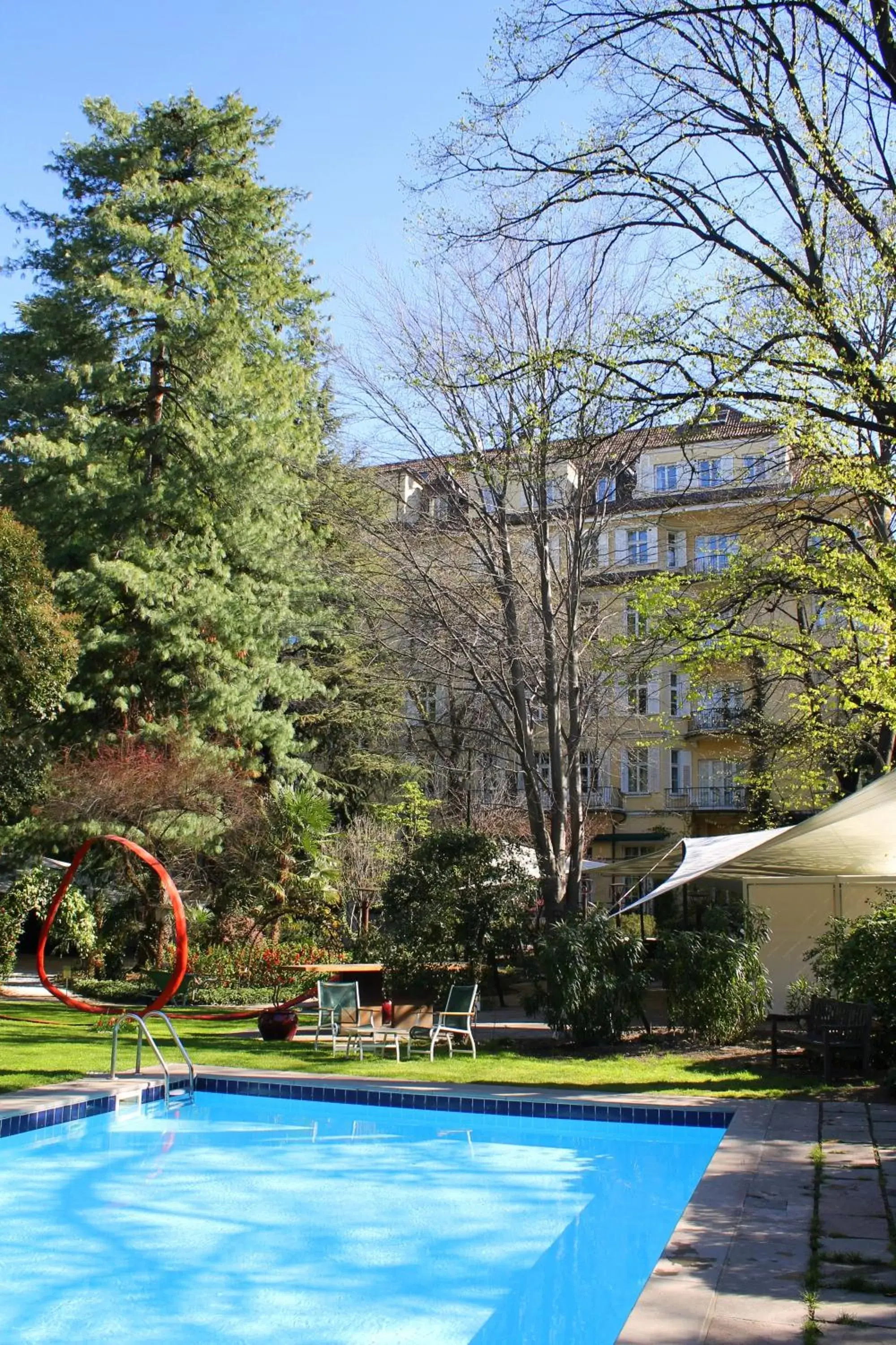 Garden, Swimming Pool in Parkhotel Laurin