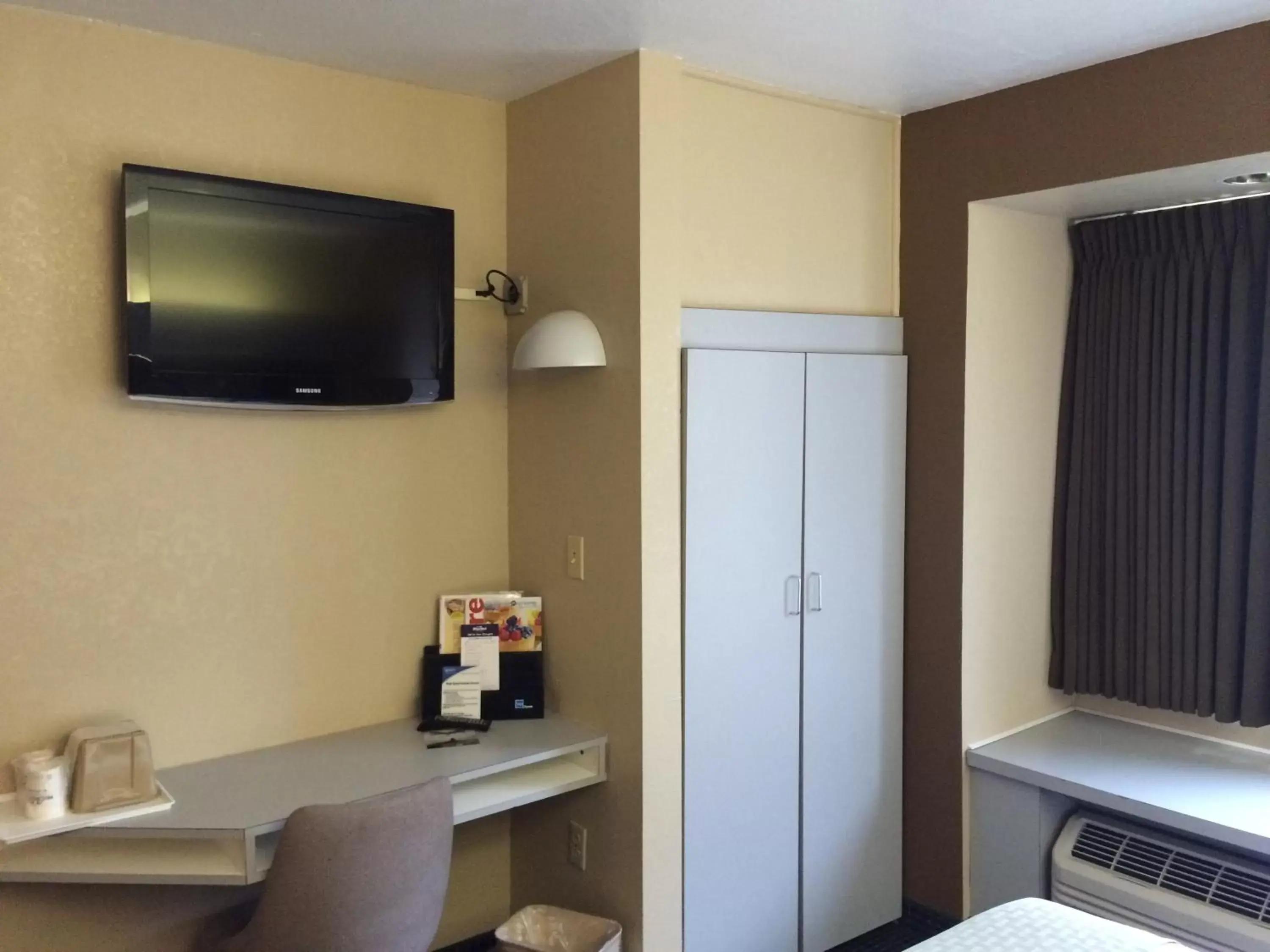 TV and multimedia, TV/Entertainment Center in Microtel Inn by Wyndham Henrietta