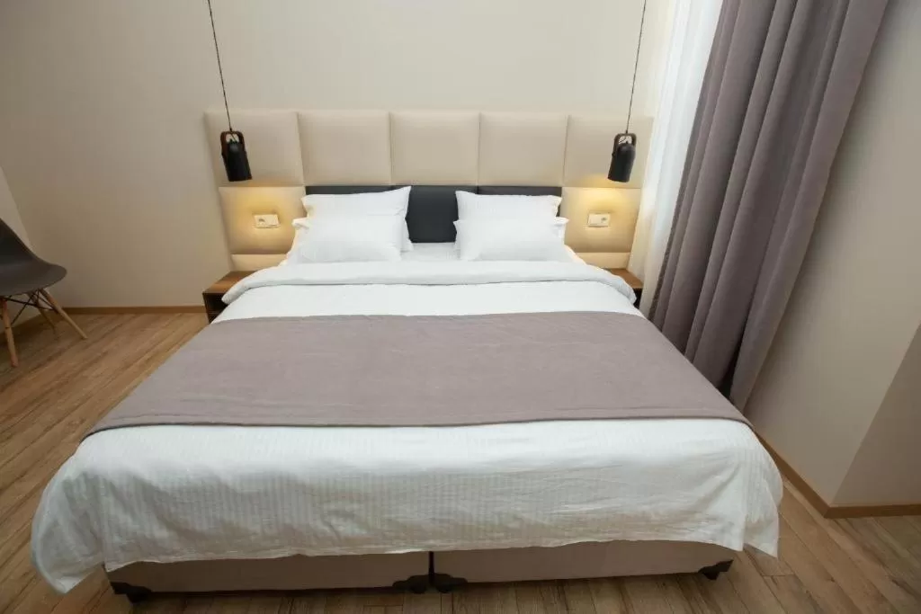 Bed in History Hotel Tbilisi