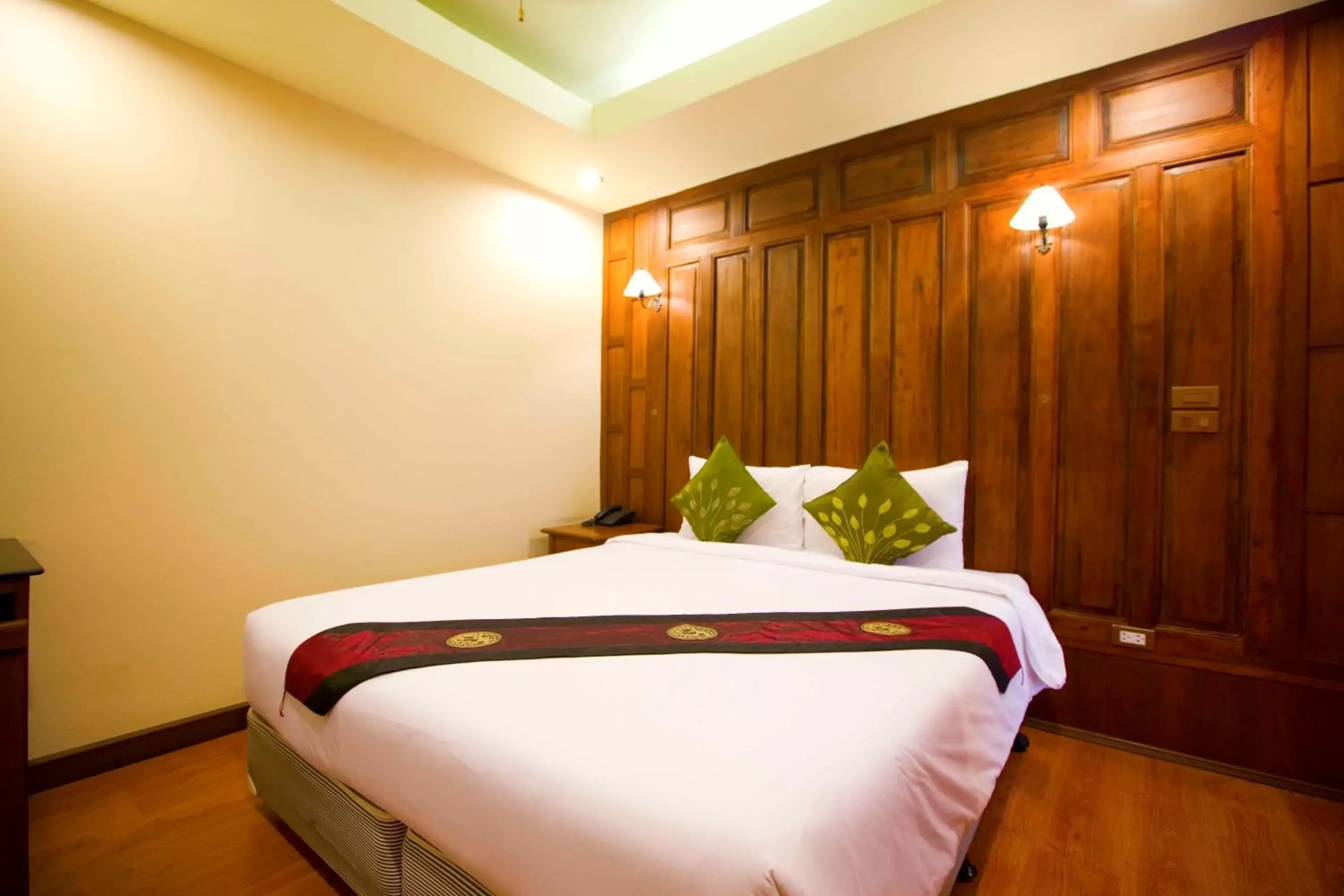 Bed in Lamphu Tree House Boutique Hotel