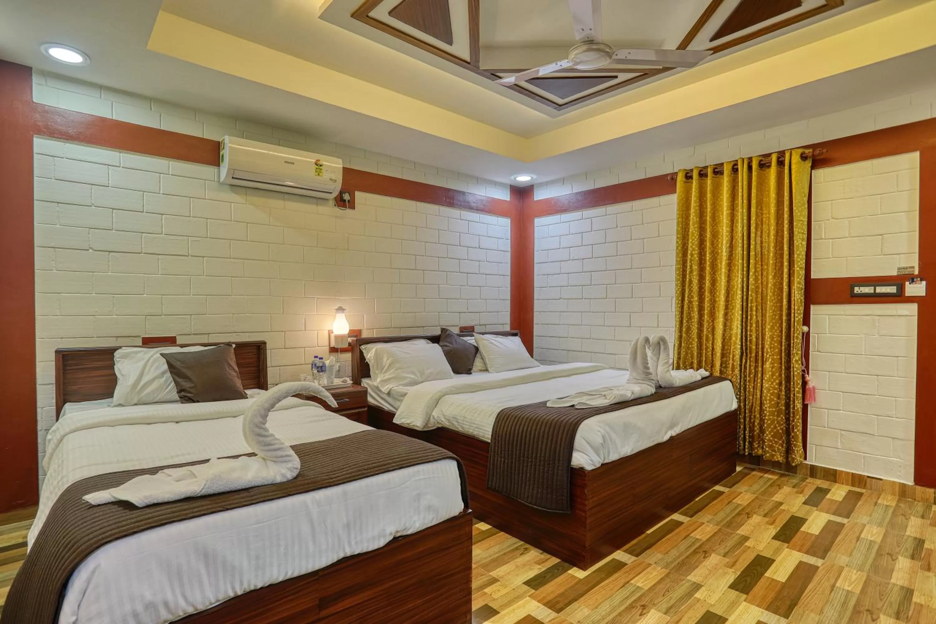 Bed in LEISURE VALLEY BEACH RESORT