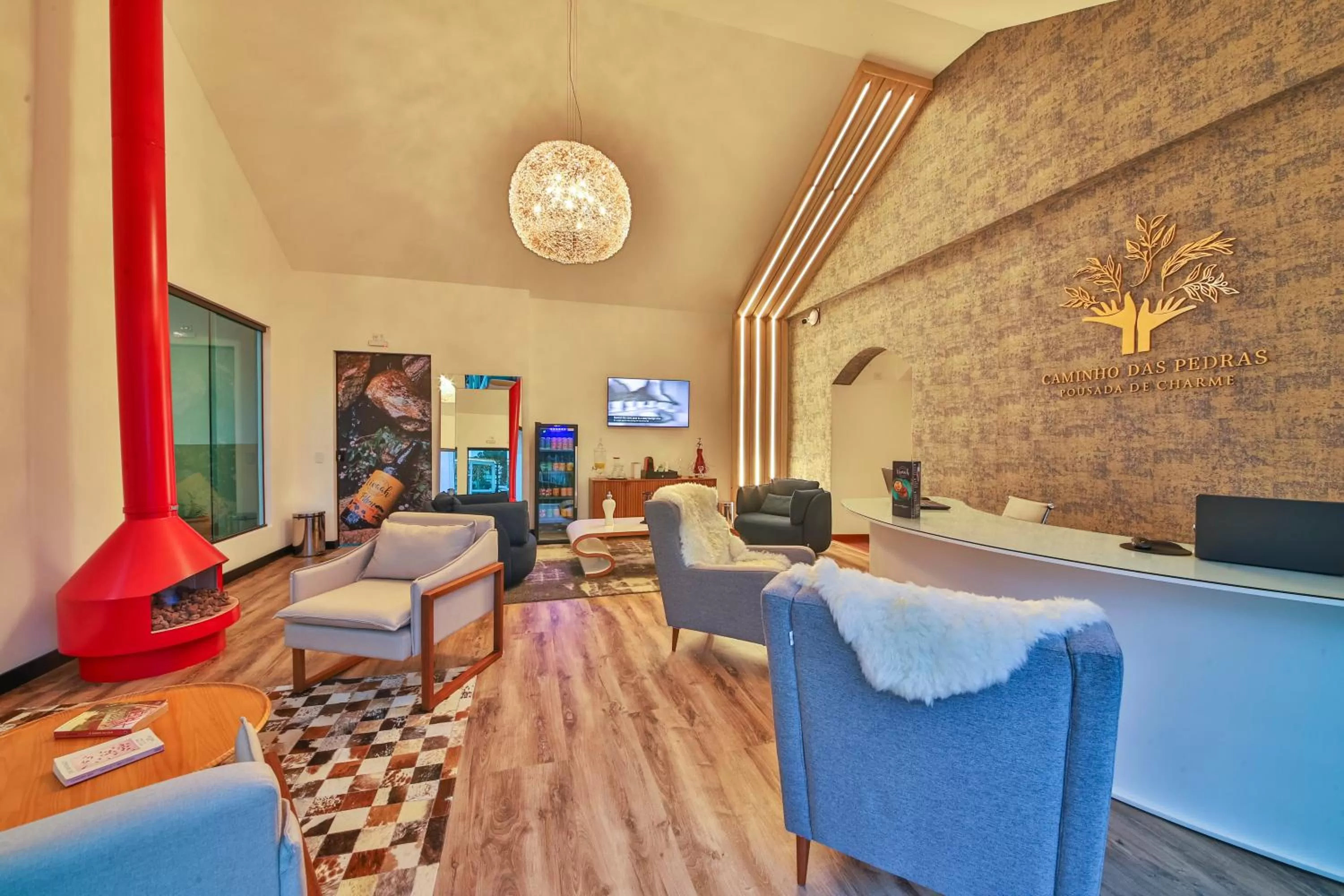 Communal lounge/ TV room in Caminho das Pedras Pousada de Charme