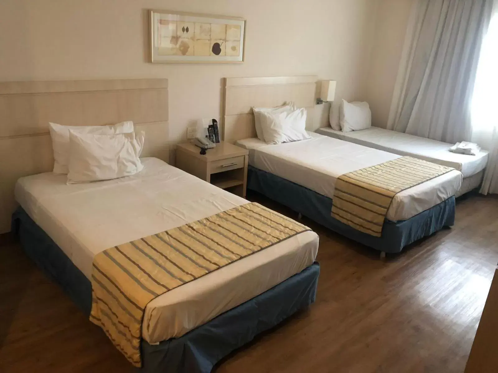 Bed in Comfort Suites Londrina
