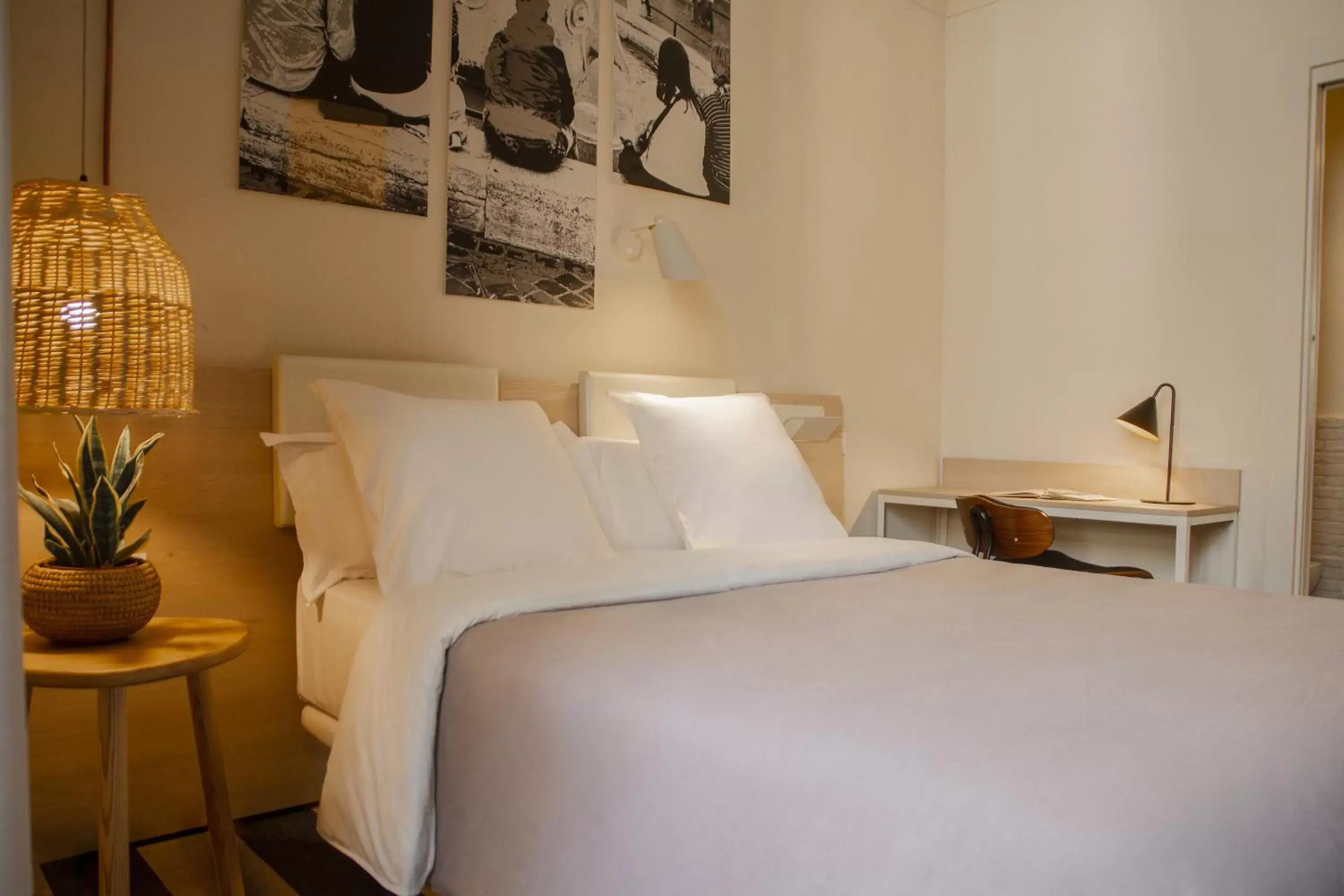 Bed in room007 Select Via Veneto