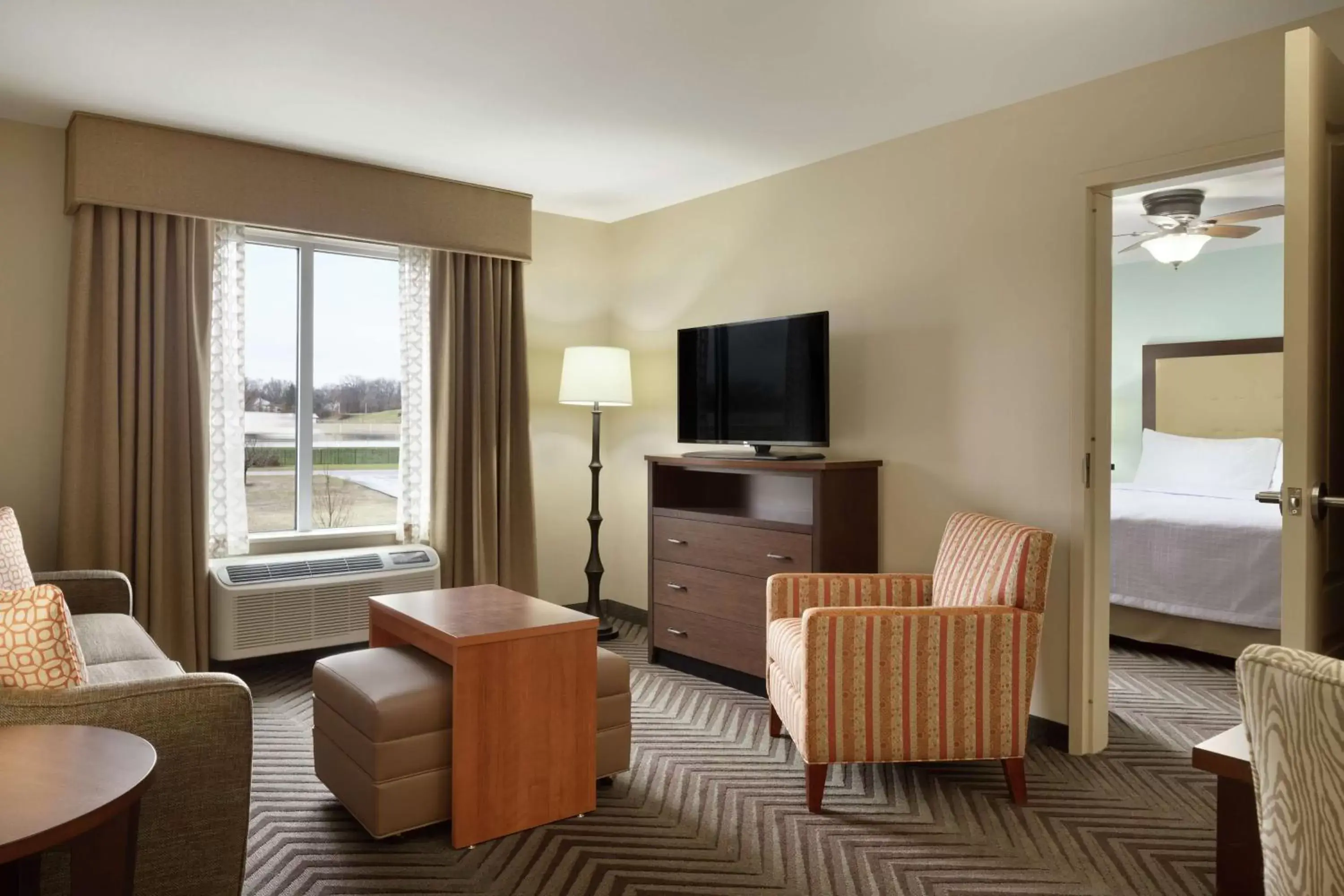 Bedroom, Seating Area in Homewood Suites by Hilton Kalamazoo-Portage