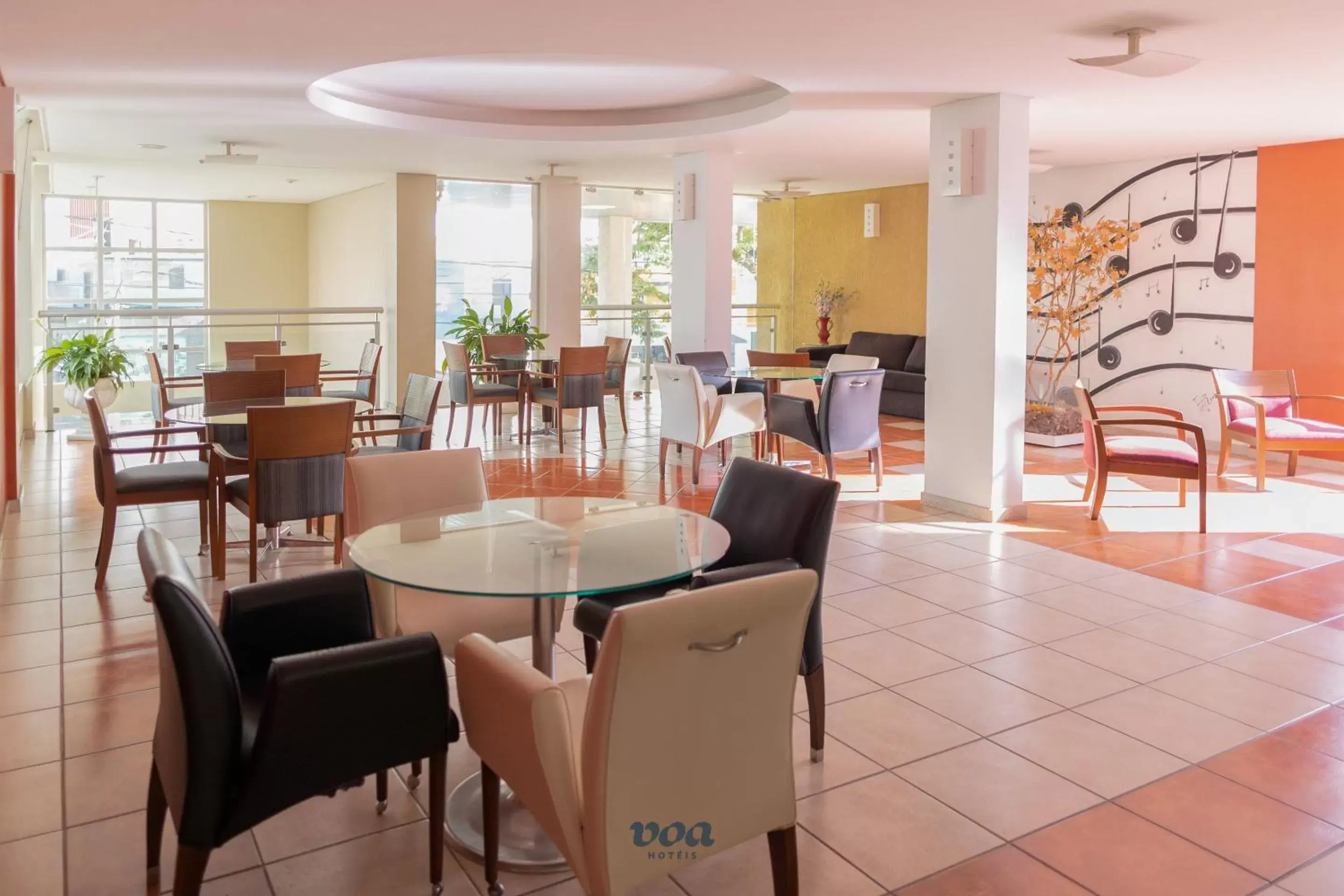 Seating area, Restaurant/Places to Eat in VOA Plazza Hotel