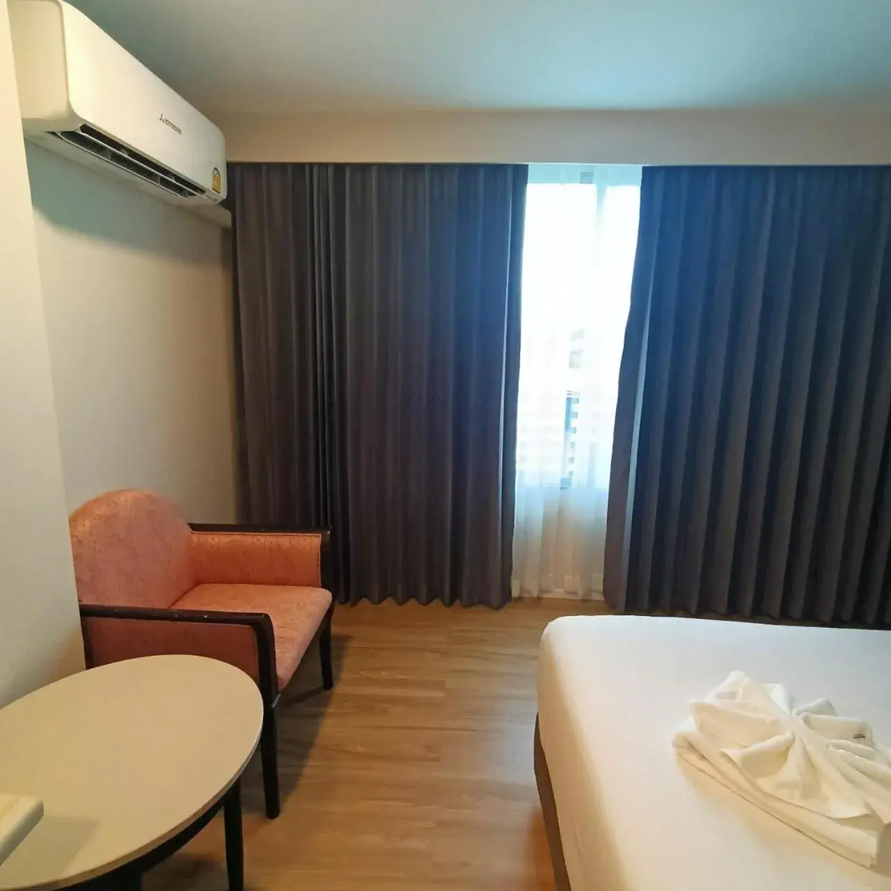 air conditioner, TV/Entertainment Center in Mayflower Grande Hotel Phitsanulok