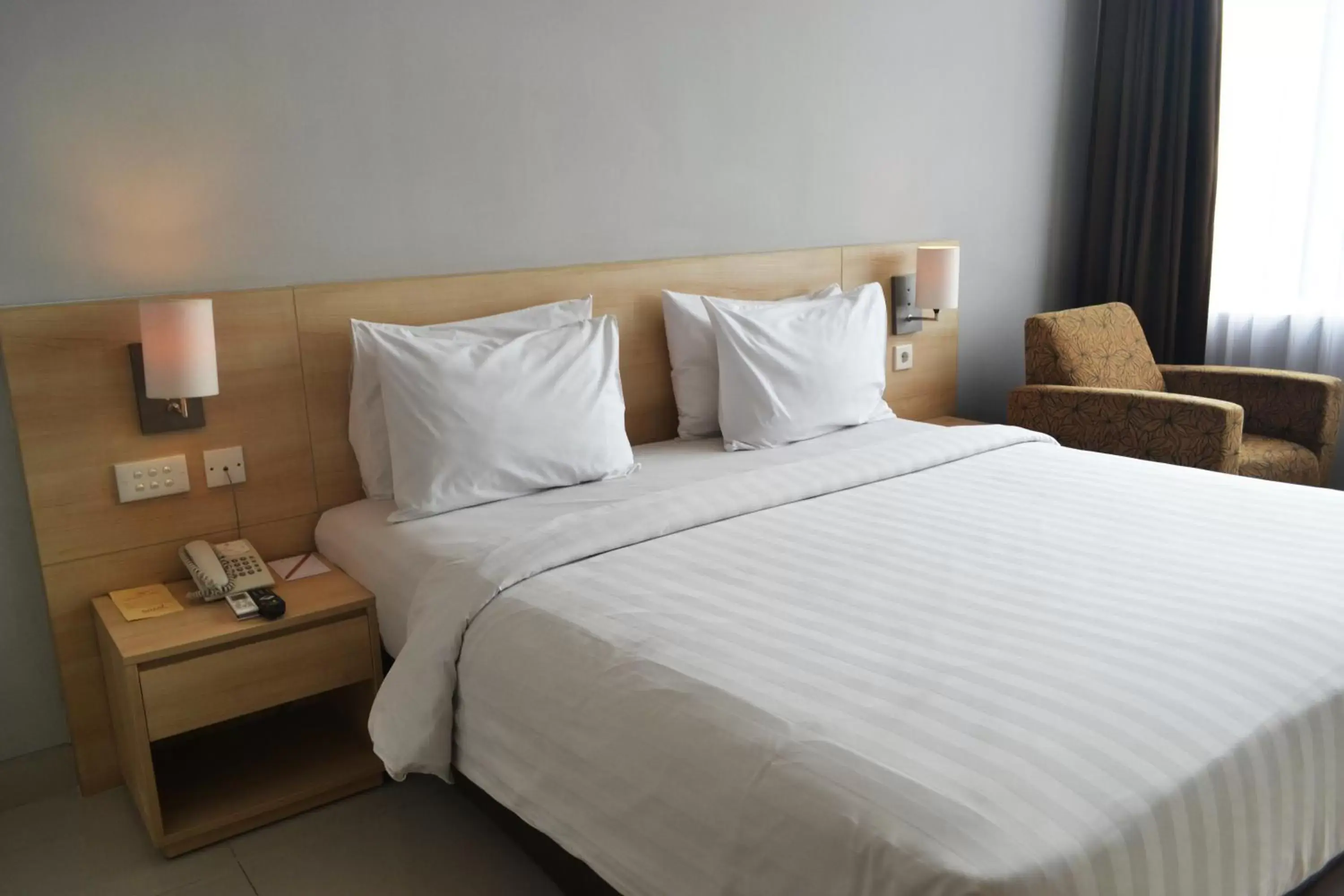 Bed in Grand Cakra Hotel Malang