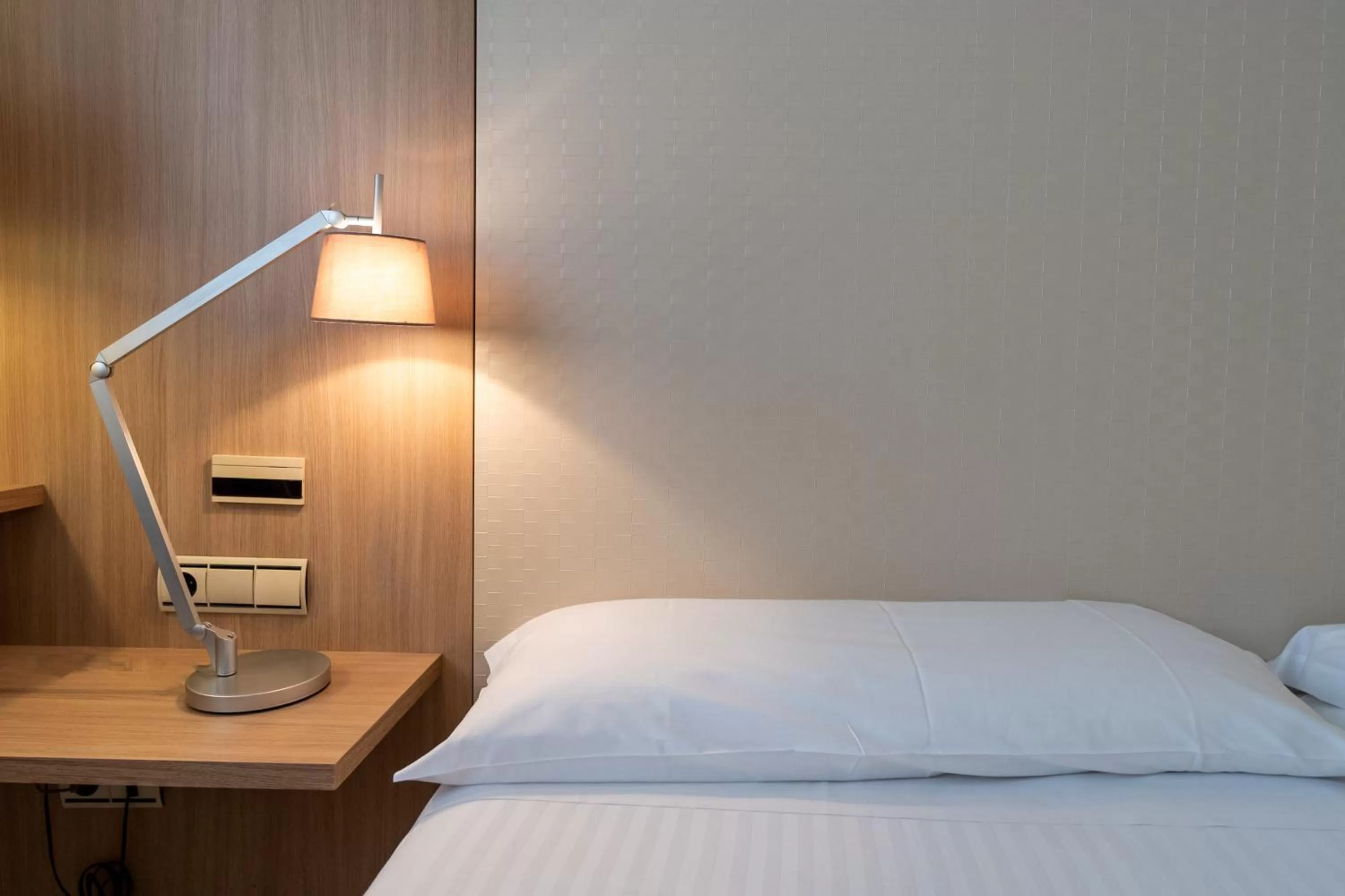 Bed in Checkin Valencia Ciscar