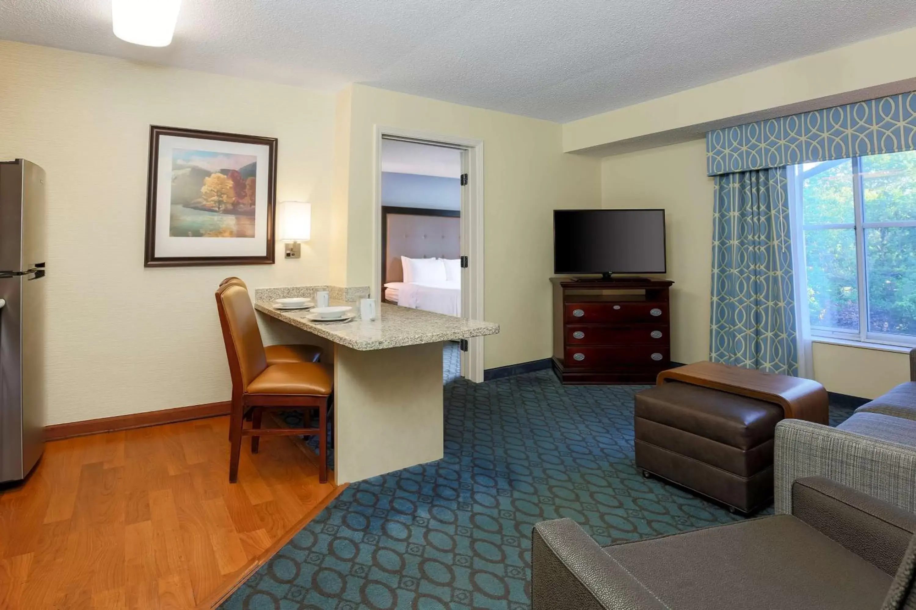 Bedroom, TV/Entertainment Center in Homewood Suites Nashville Airport