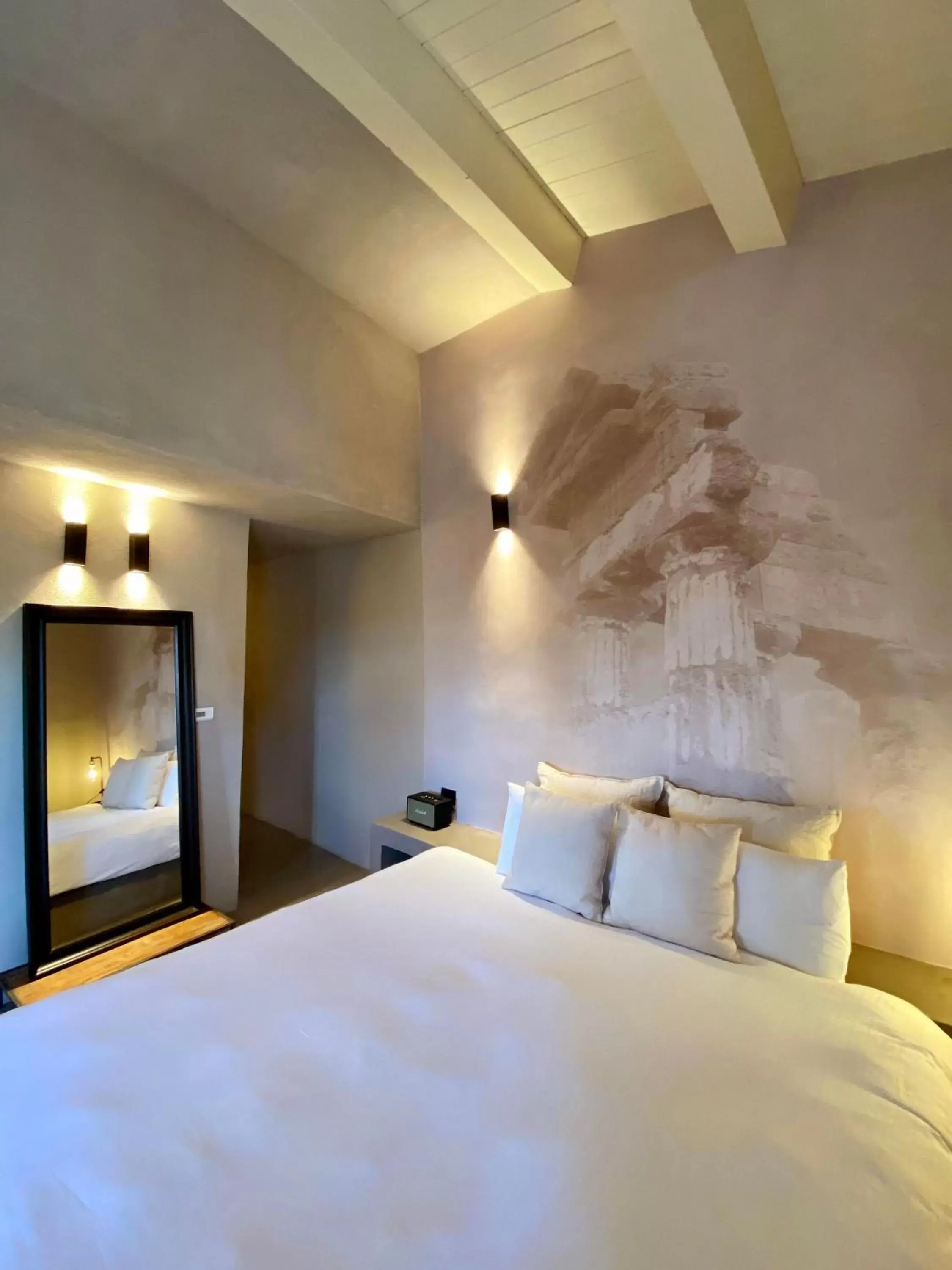 Bed in Casa Nostra Boutique Hotel