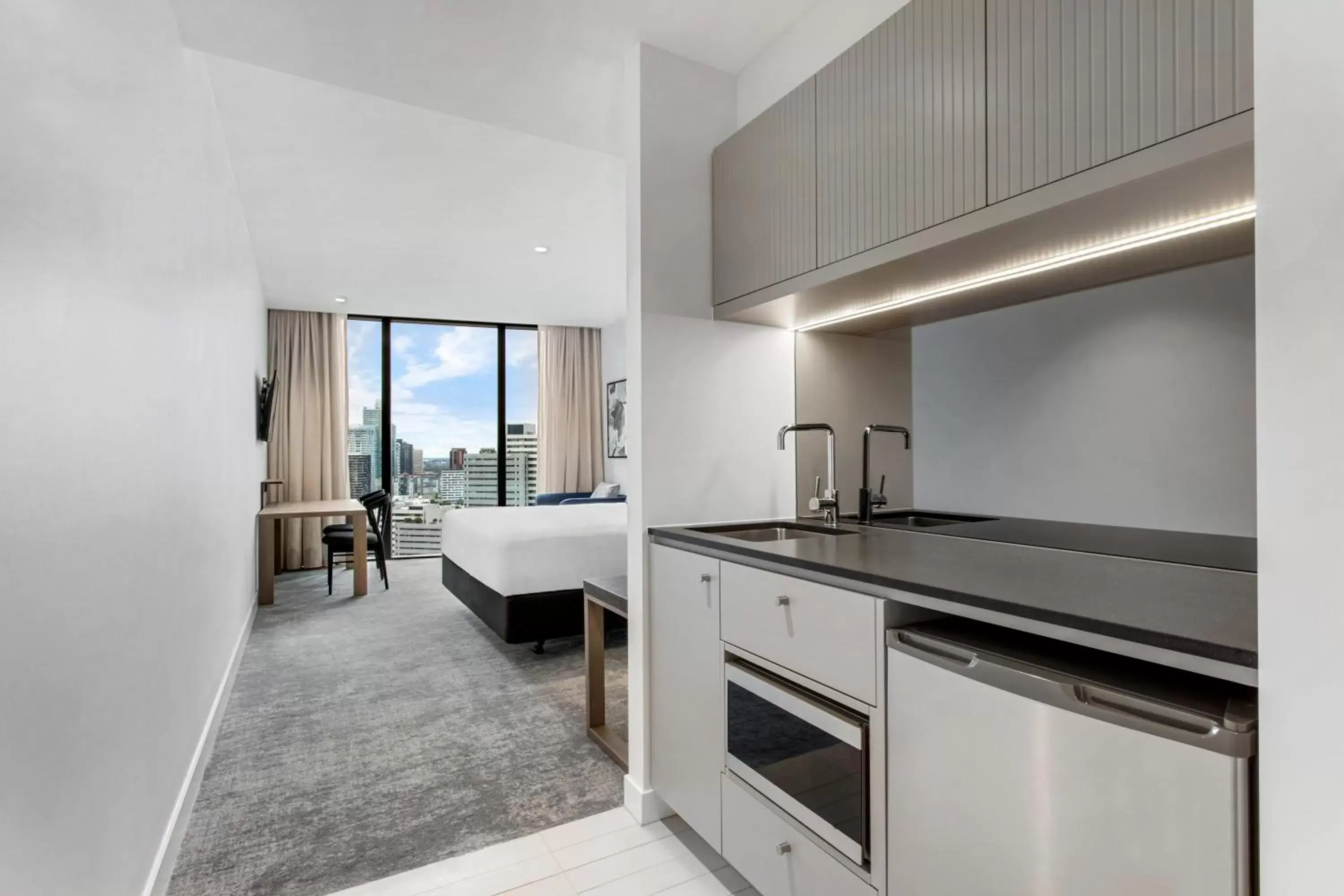 Kitchen/Kitchenette in Adina Apartment Hotel Melbourne Southbank