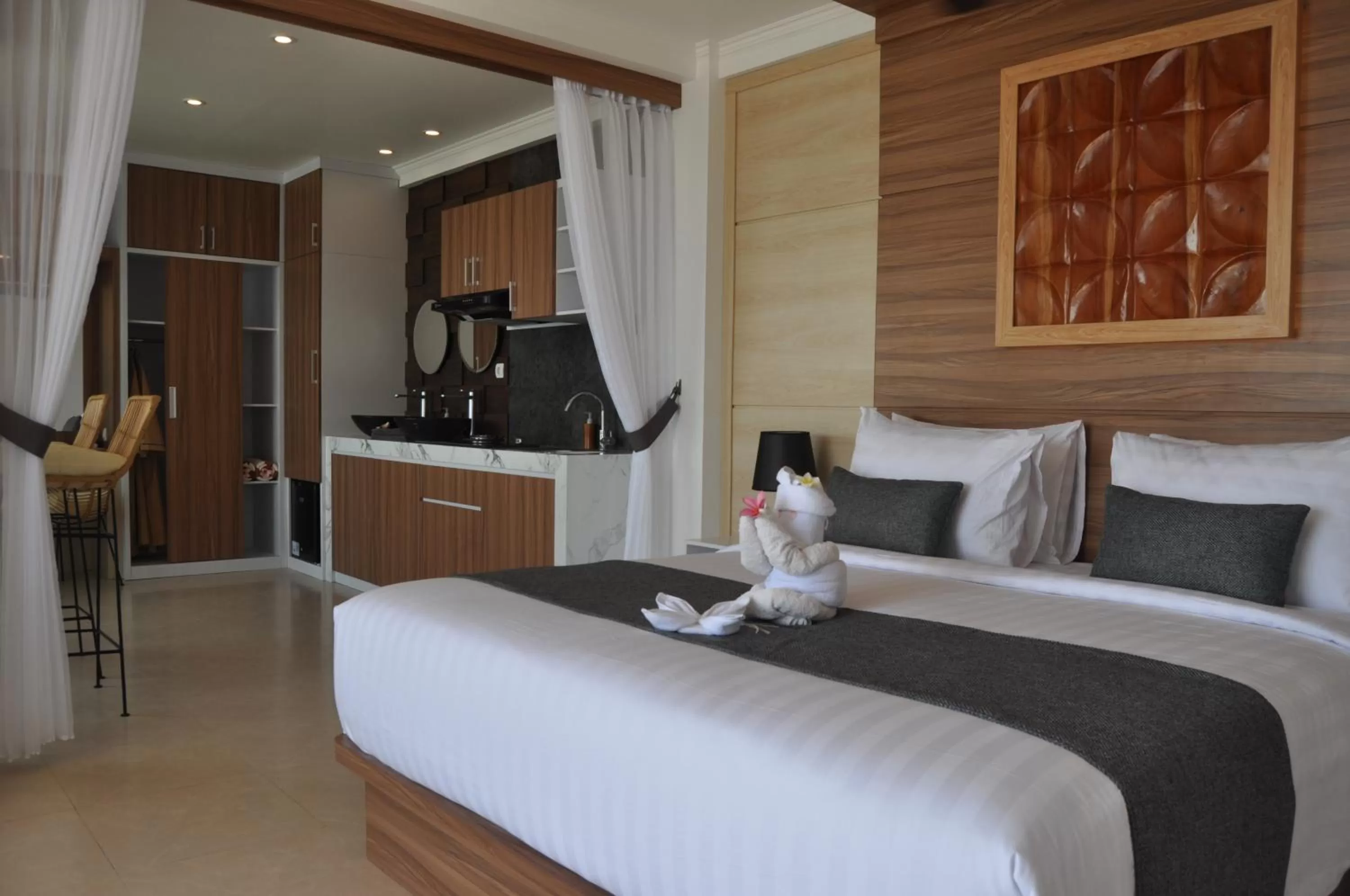 Bed in SUITE OCEAN BLUE