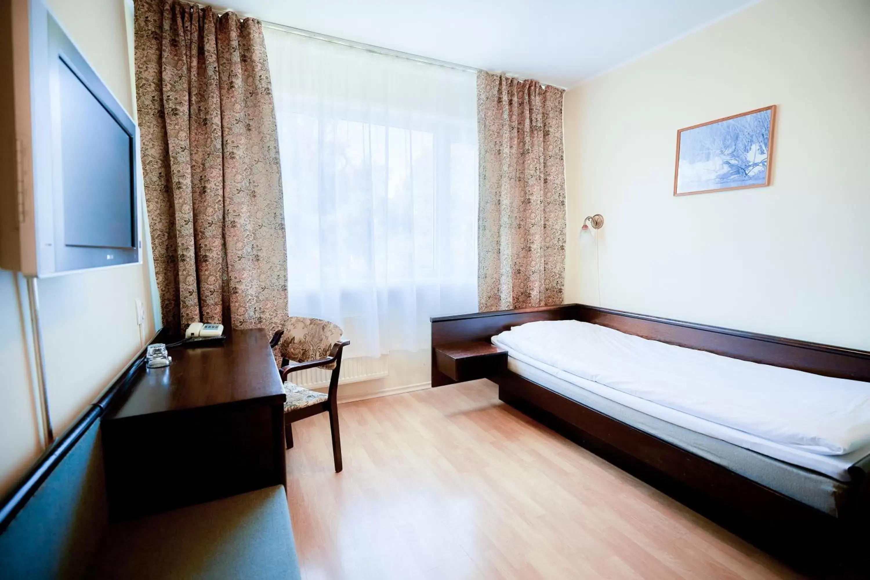 Bed in Hotel Dzingel