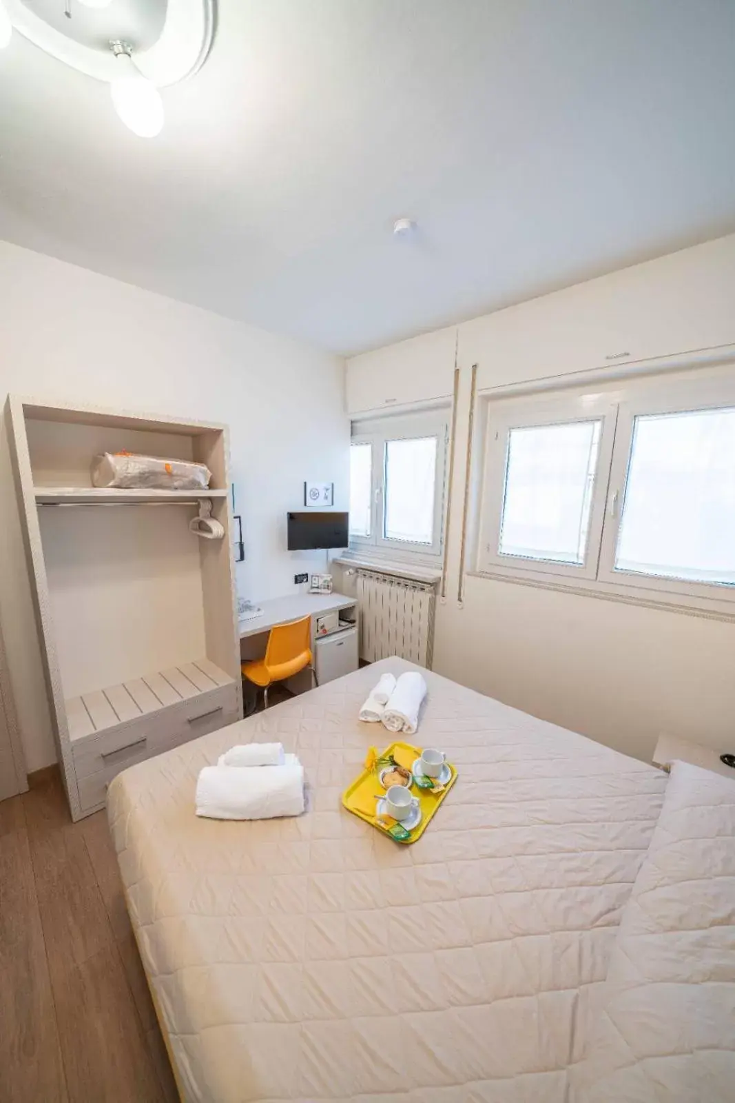 Bed in Hotel Cairoli Bed in Hotel Cairoli