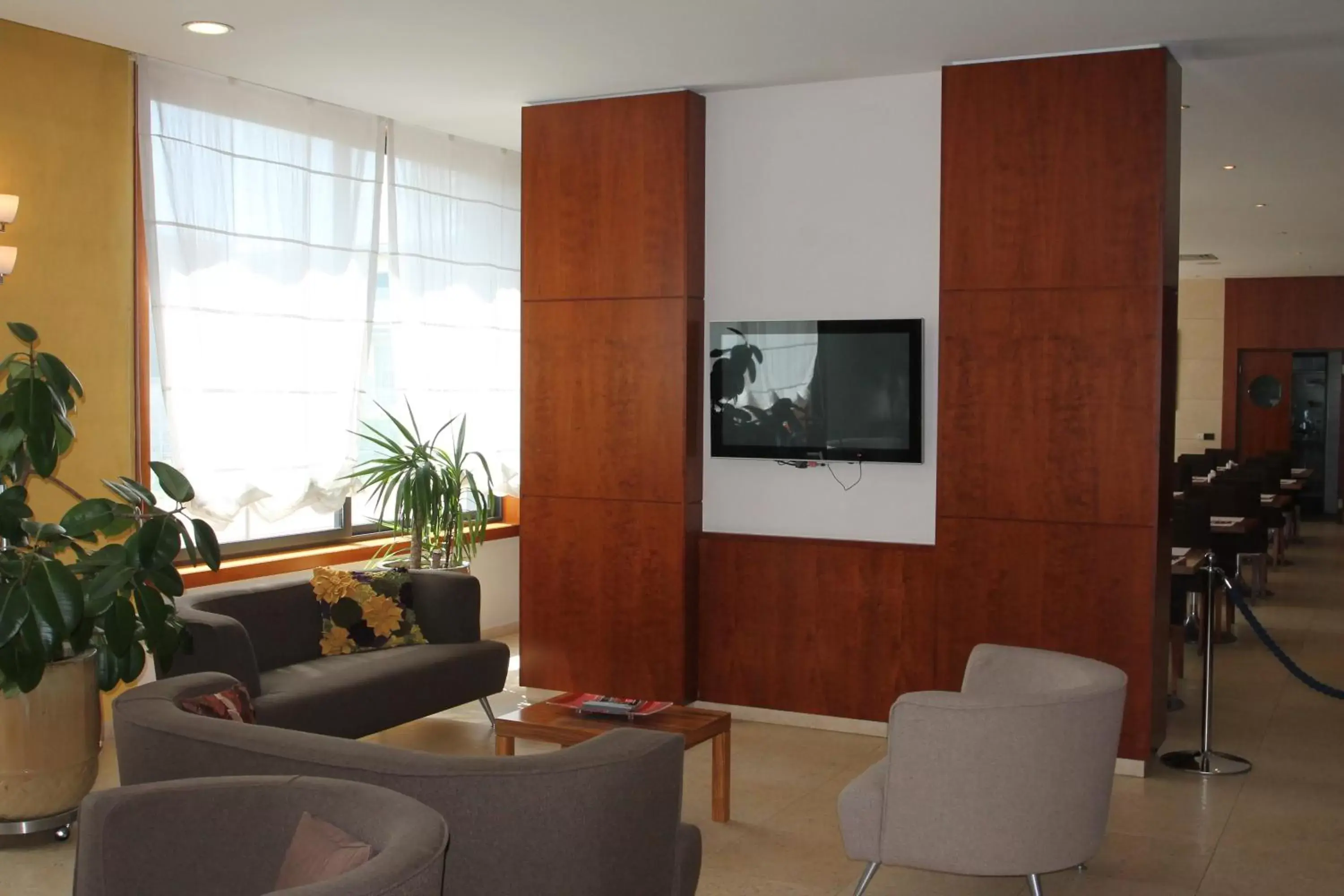 Communal lounge/ TV room, Seating Area in MH Hotel Piacenza Fiera