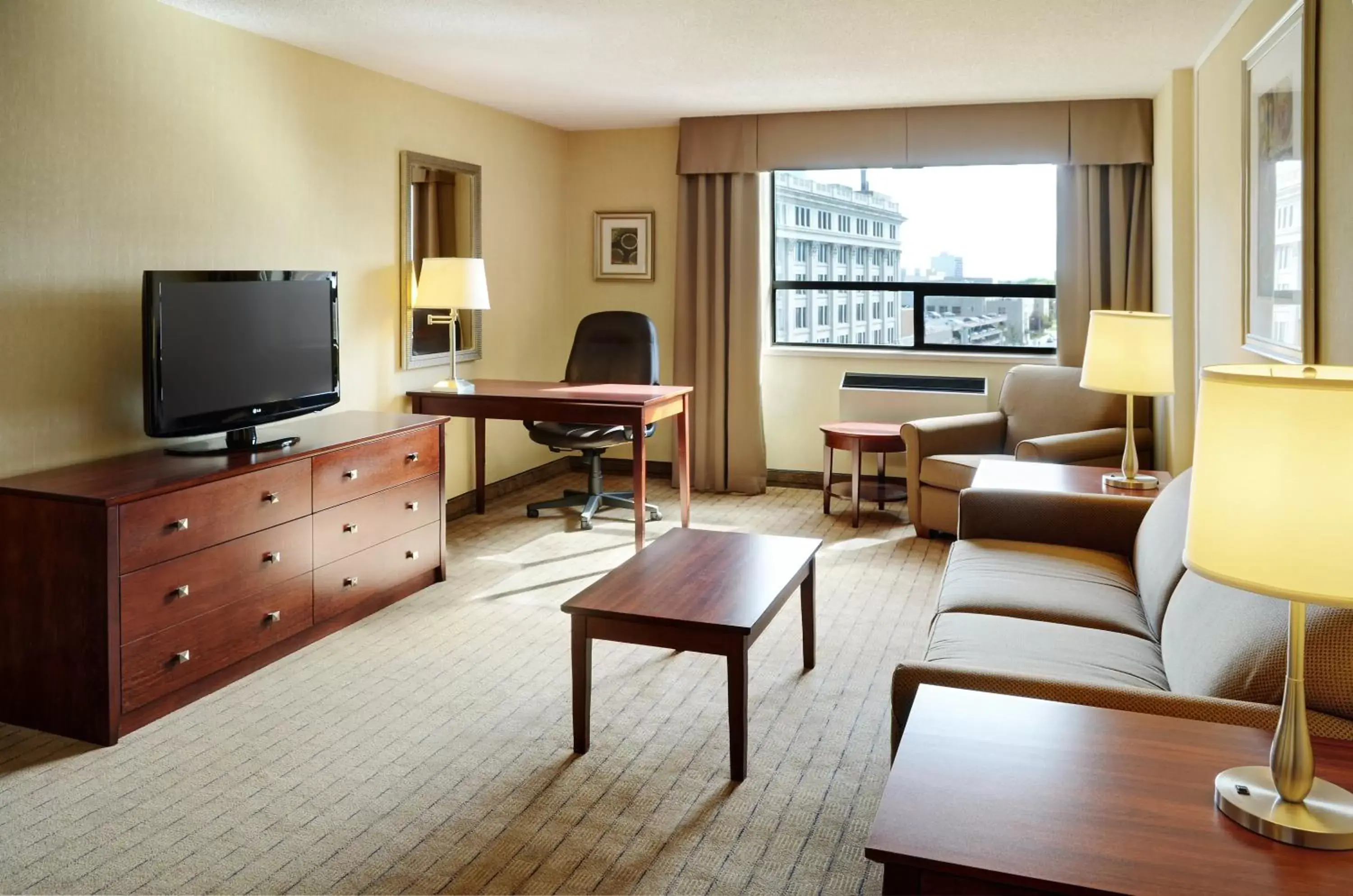 Photo of the whole room, TV/Entertainment Center in Holiday Inn & Suites Winnipeg Downtown, an IHG Hotel