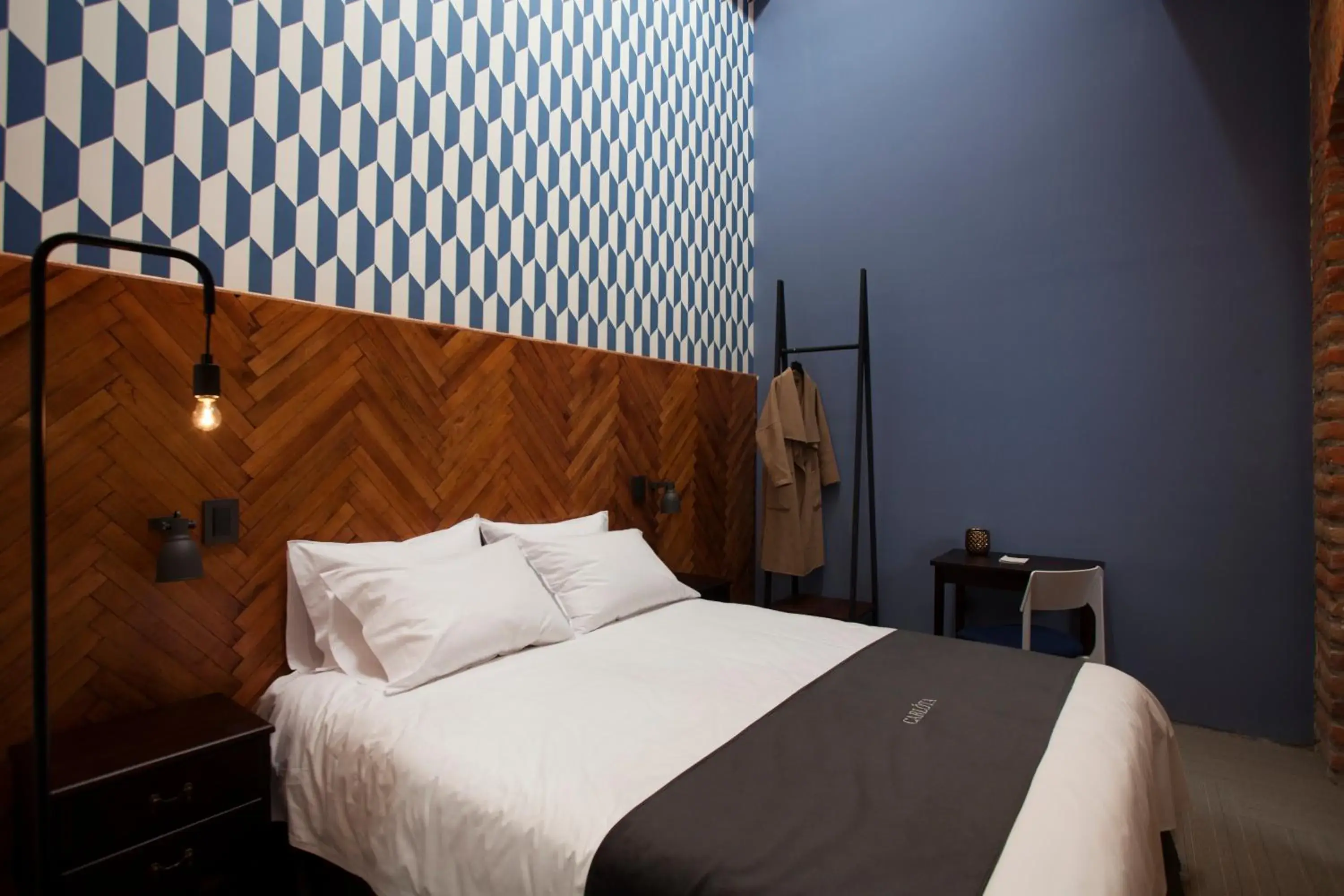 Bed in Carlota Sustainable Design Hotel