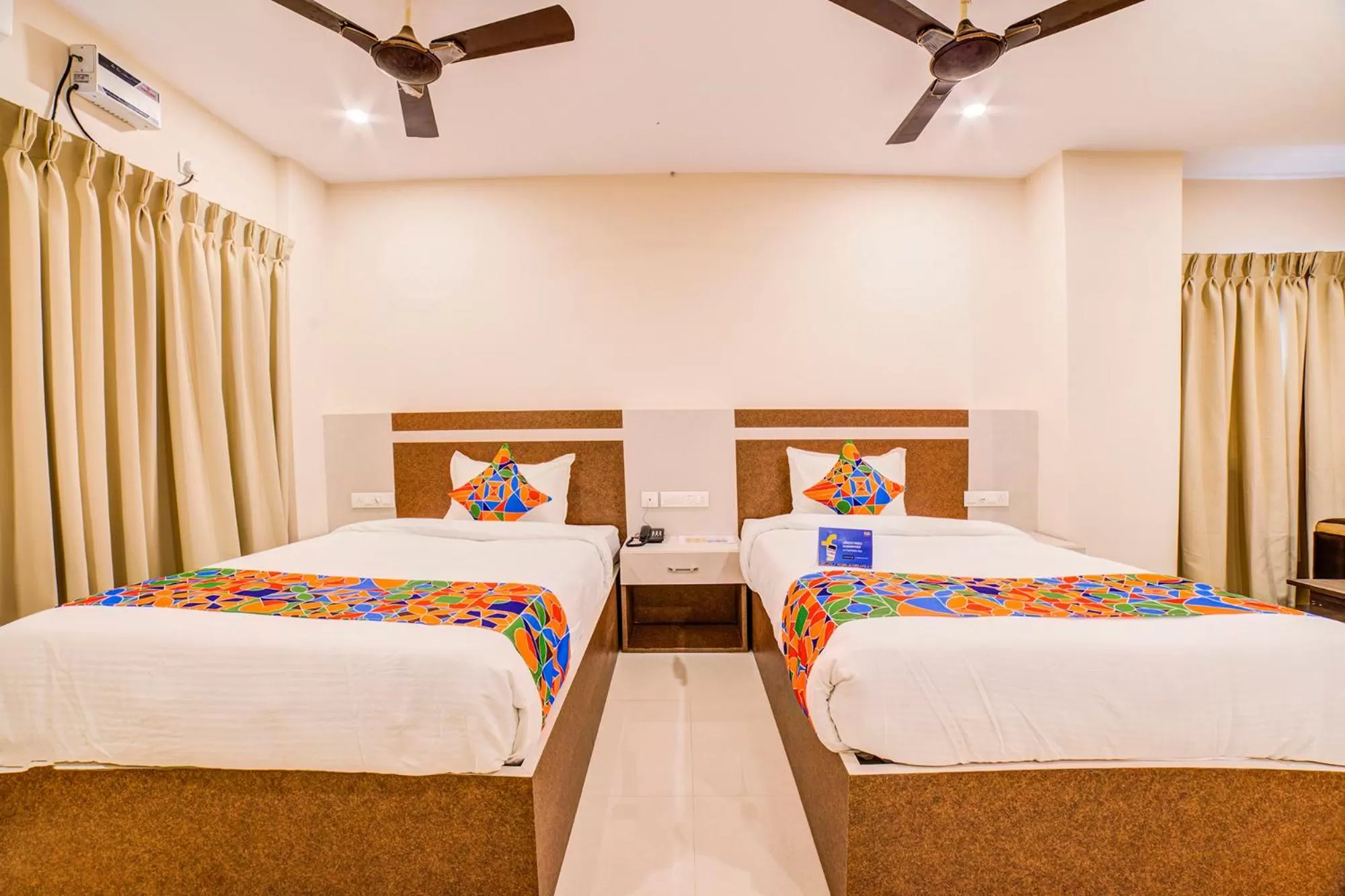 Bed in FabHotel Spark Inn Dwarakanagar