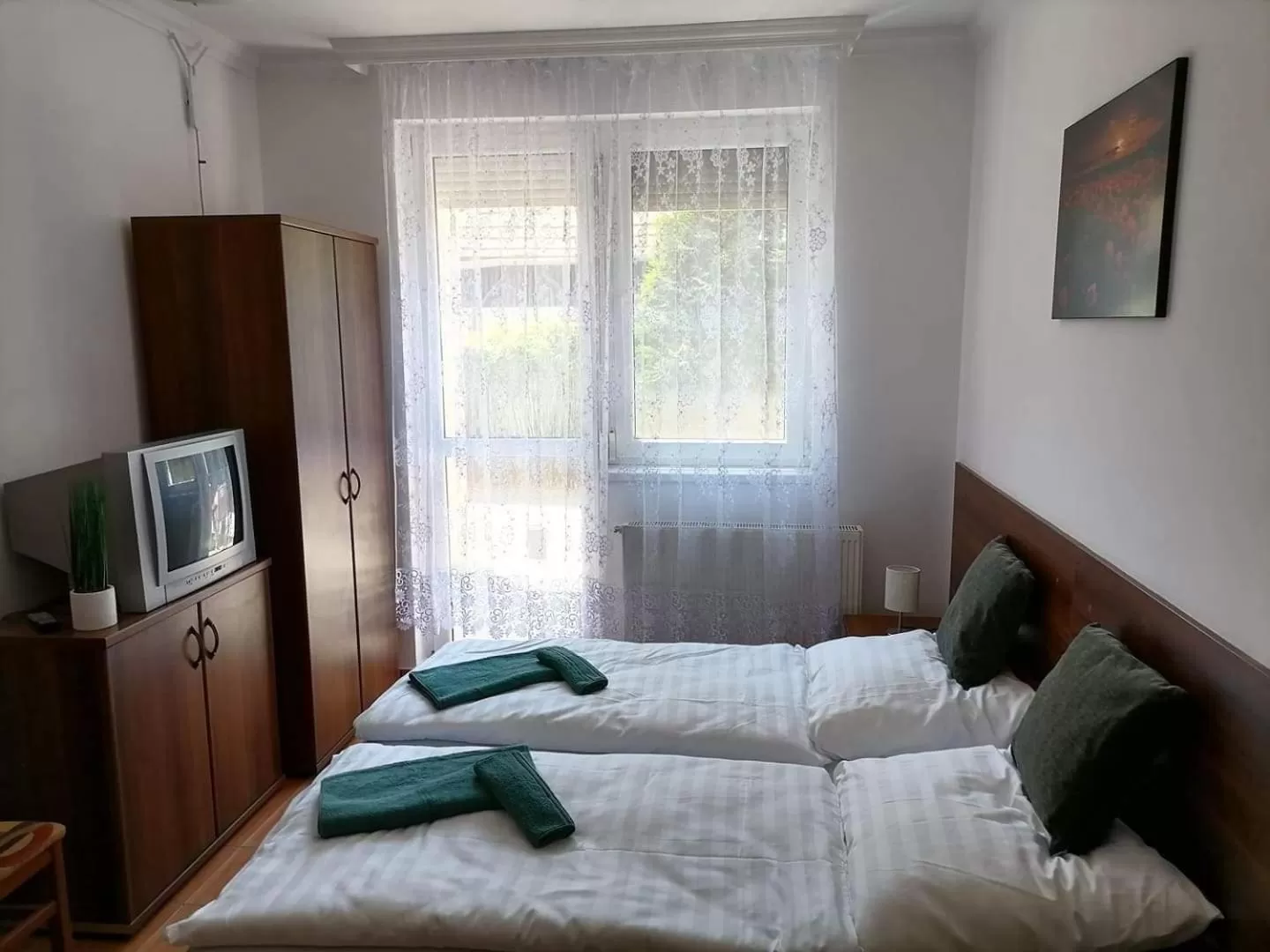 Bed in Aqua Oazis Apartman