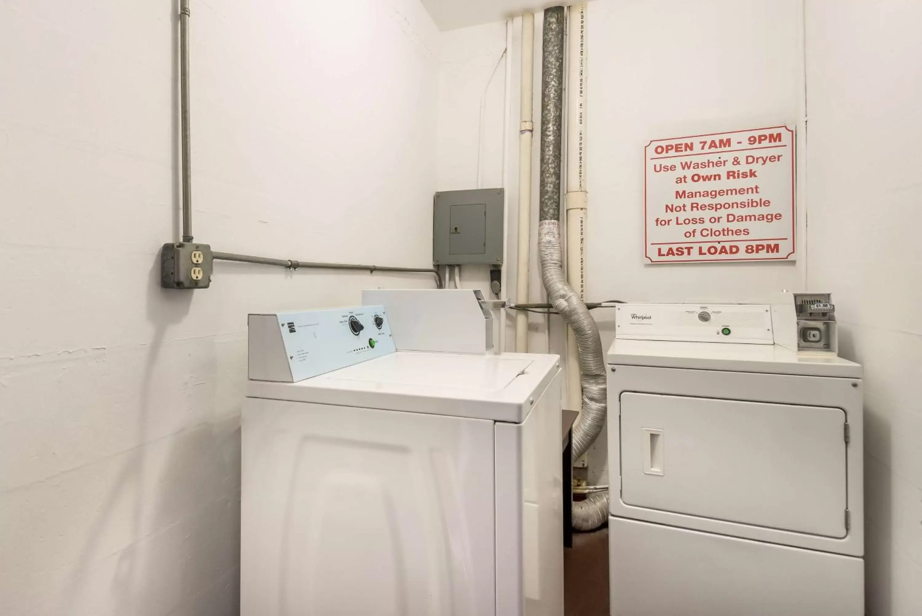 On site, Bathroom in SureStay Hotel by Best Western Sarasota Lido Beach