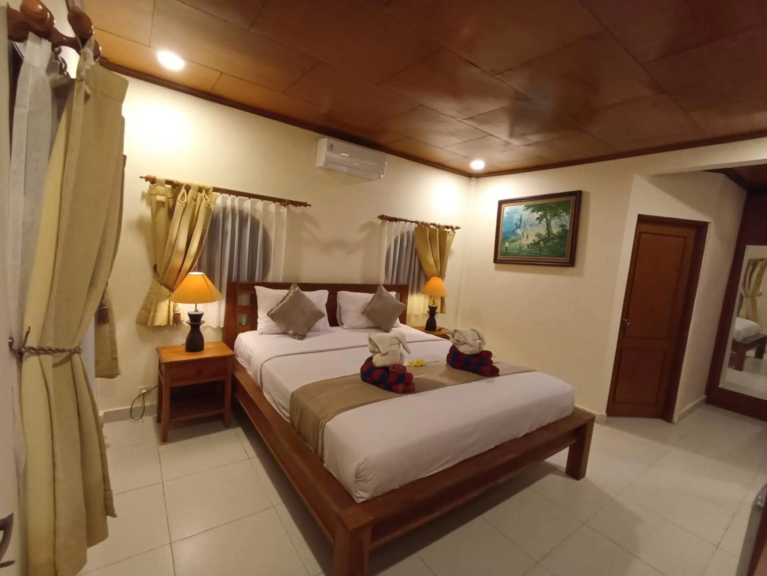 Bed in Kusnadi Hotel Bed in Kusnadi Hotel