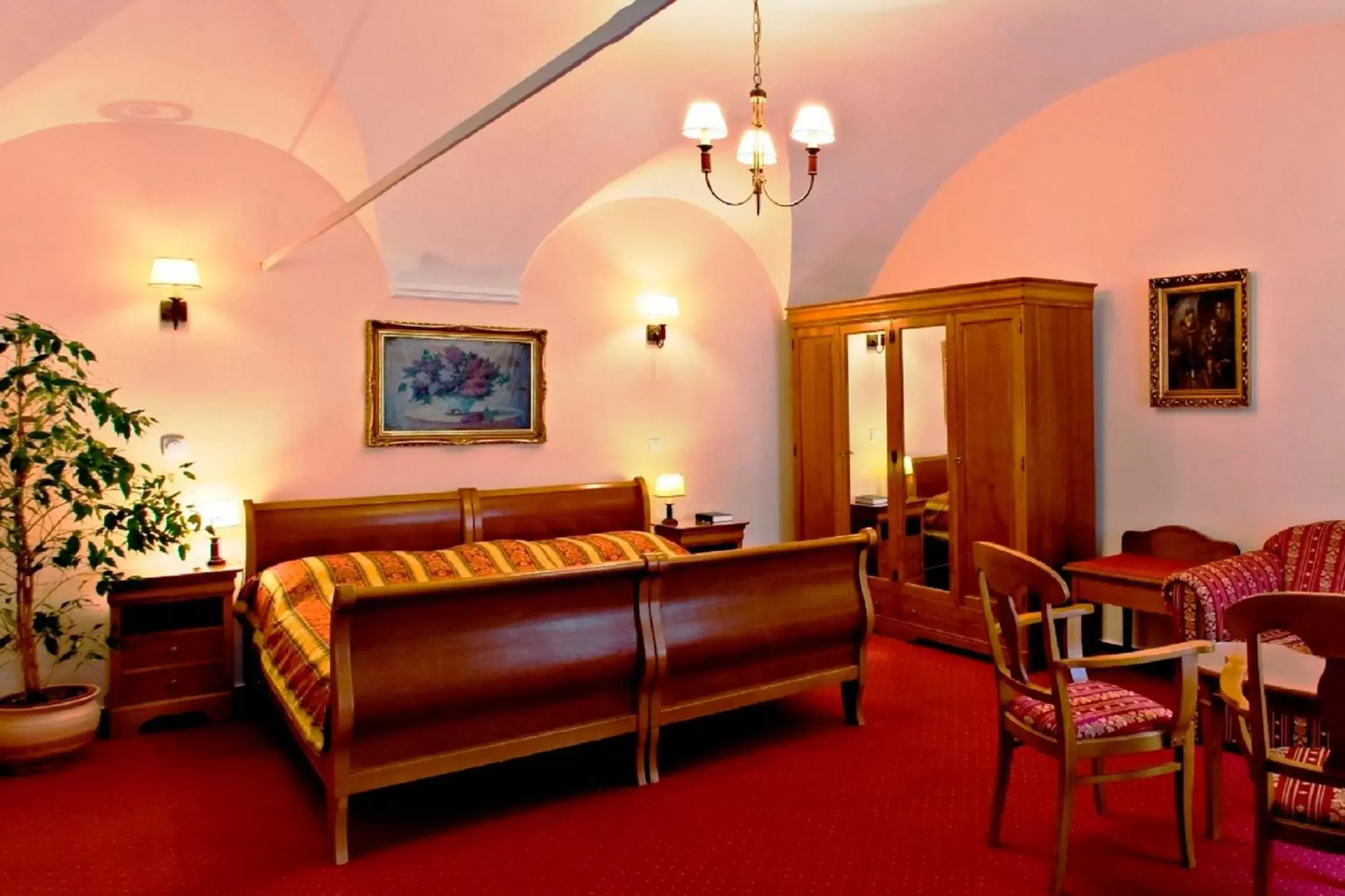 Bed, Seating Area in Hotel Wollner