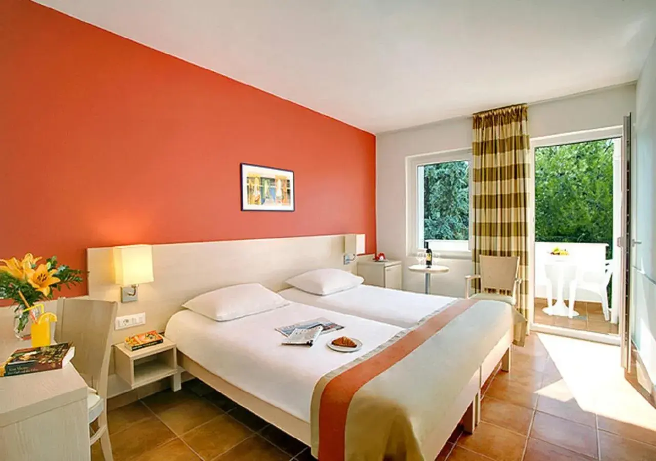 Balcony/Terrace, Bed in Valamar Tamaris Resort