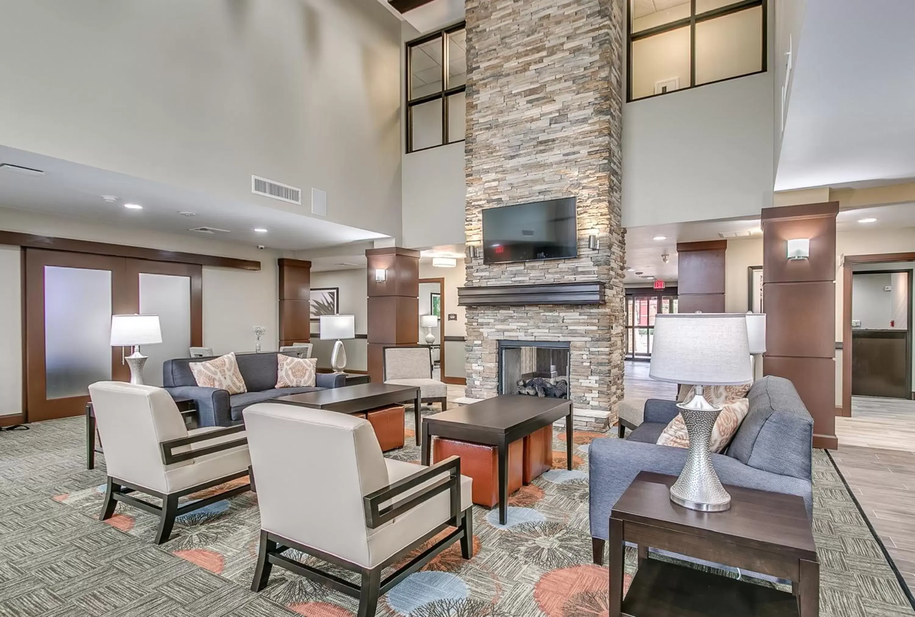 Property building, Seating Area in Staybridge Suites Lubbock South, an IHG Hotel