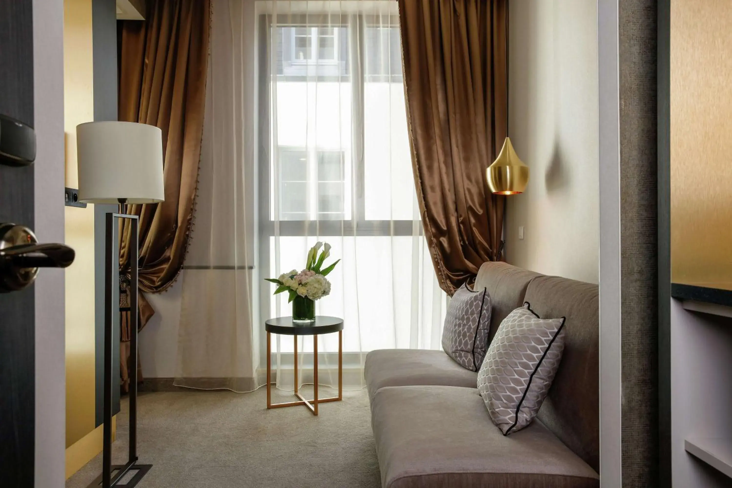 Living room, Seating Area in Niepce Paris, Curio Collection By Hilton