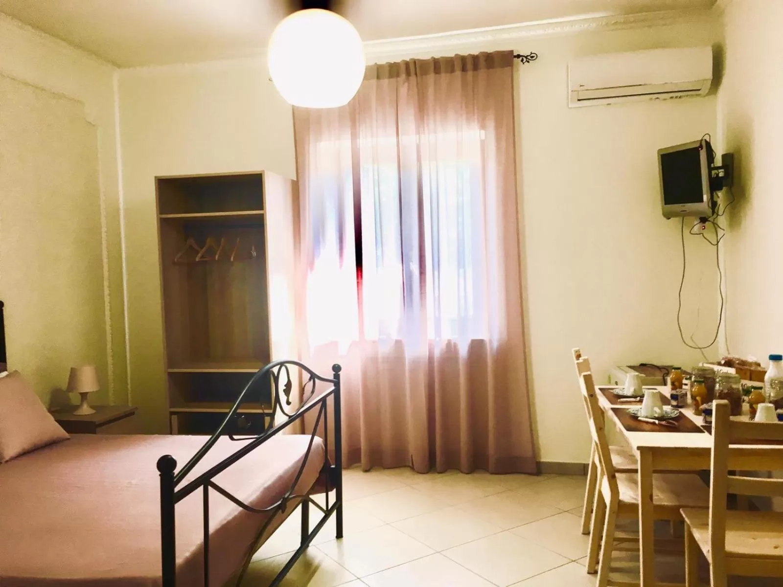 Seating area, Bed in B&B LA PIETRA