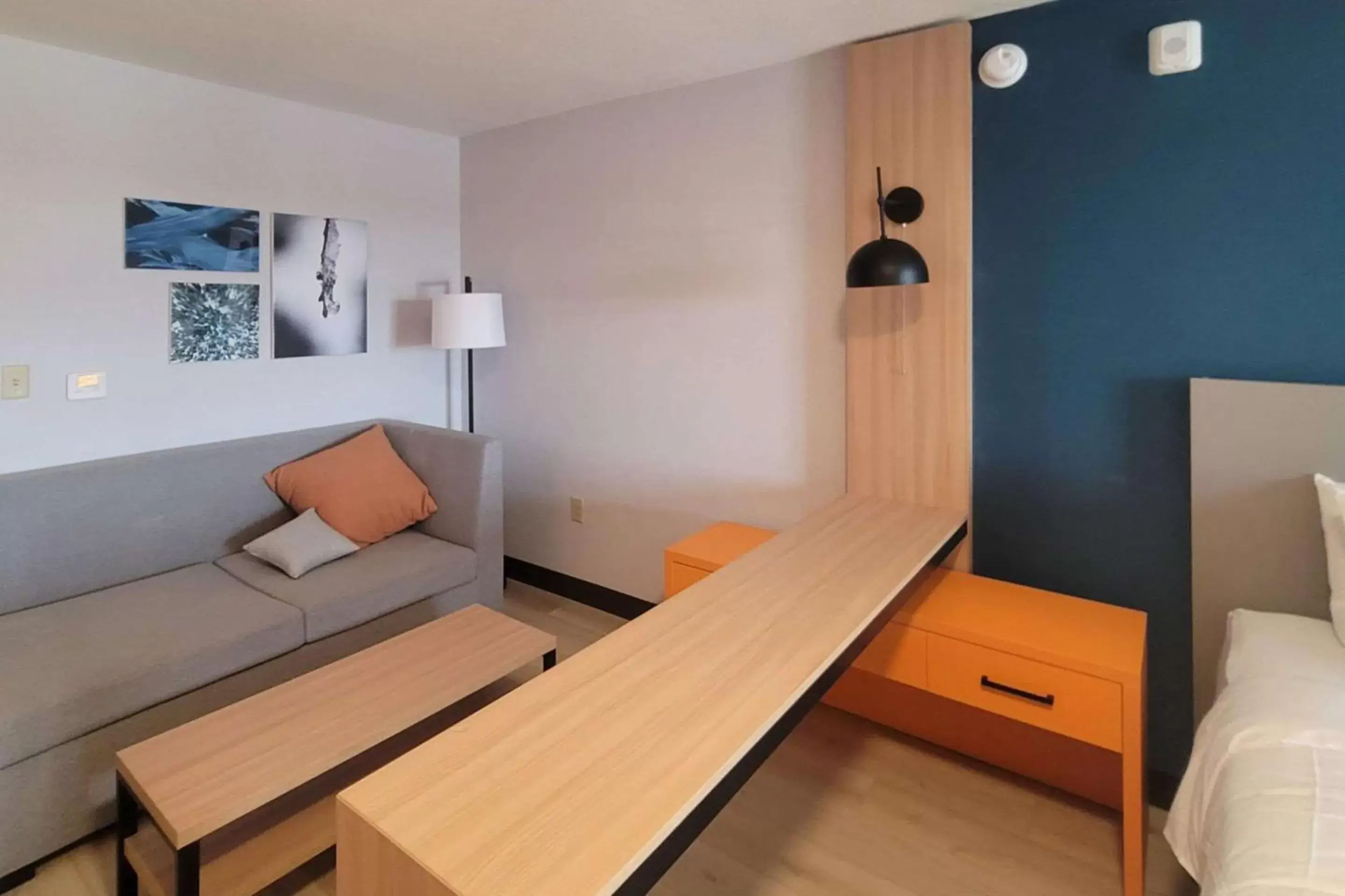 Bedroom, Seating Area in Comfort Suites