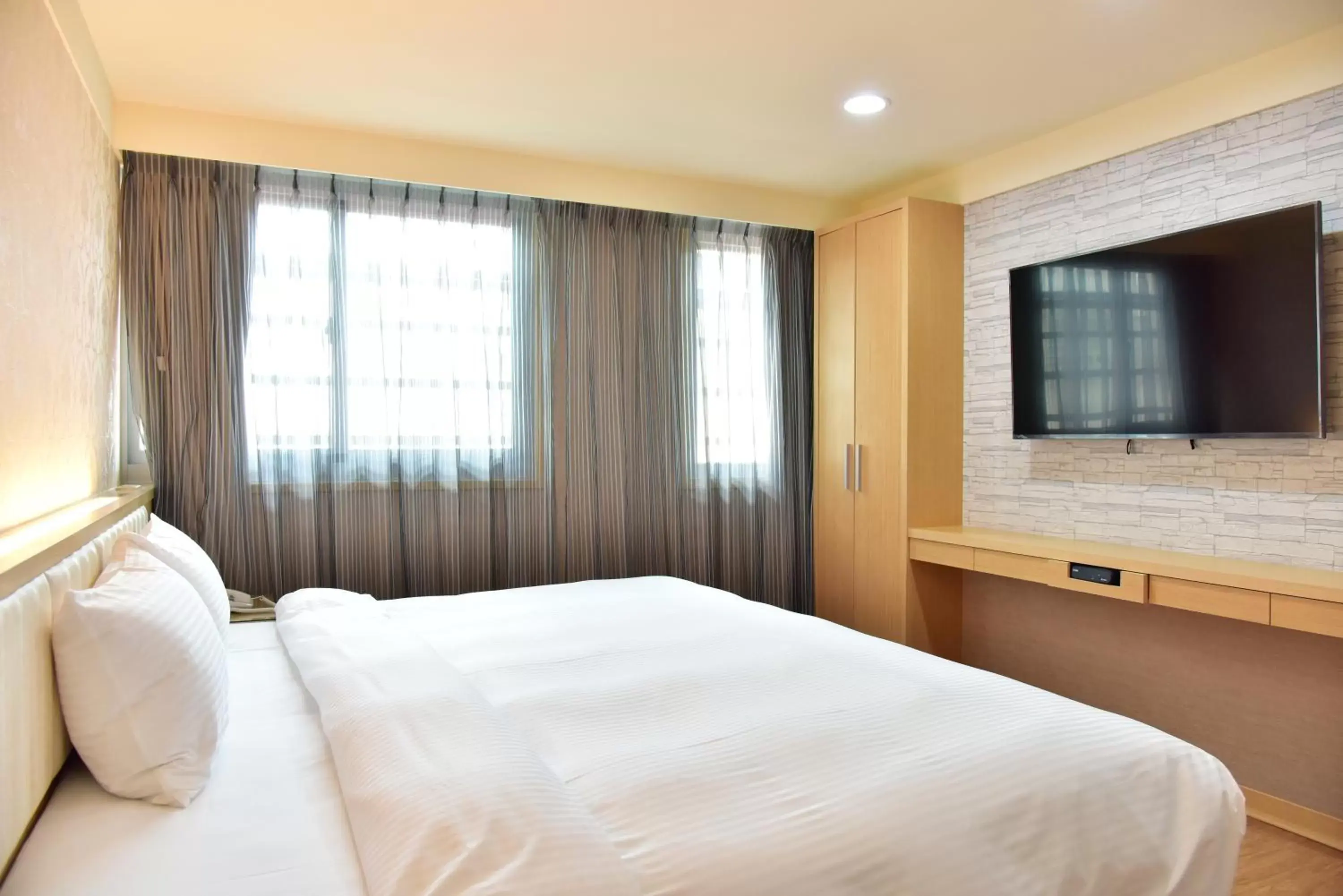 Bed in Mei Hotel Bed in Mei Hotel