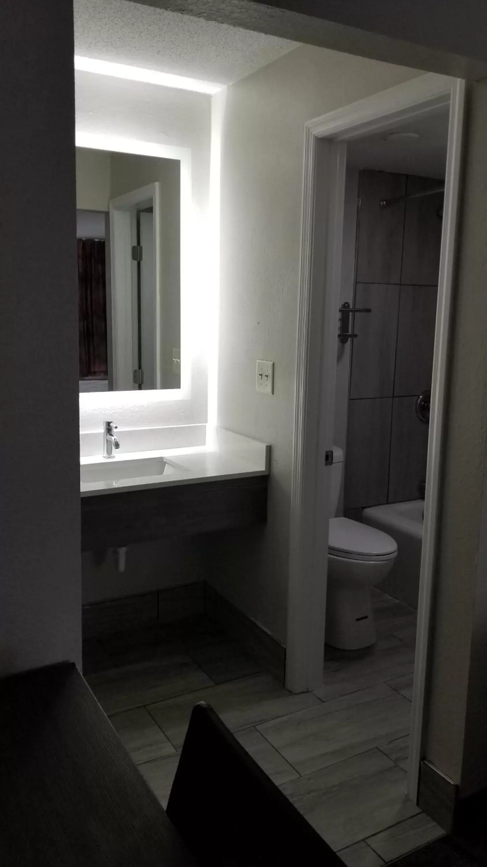 Bathroom in Days Inn & Suites by Wyndham Charleston Airport West